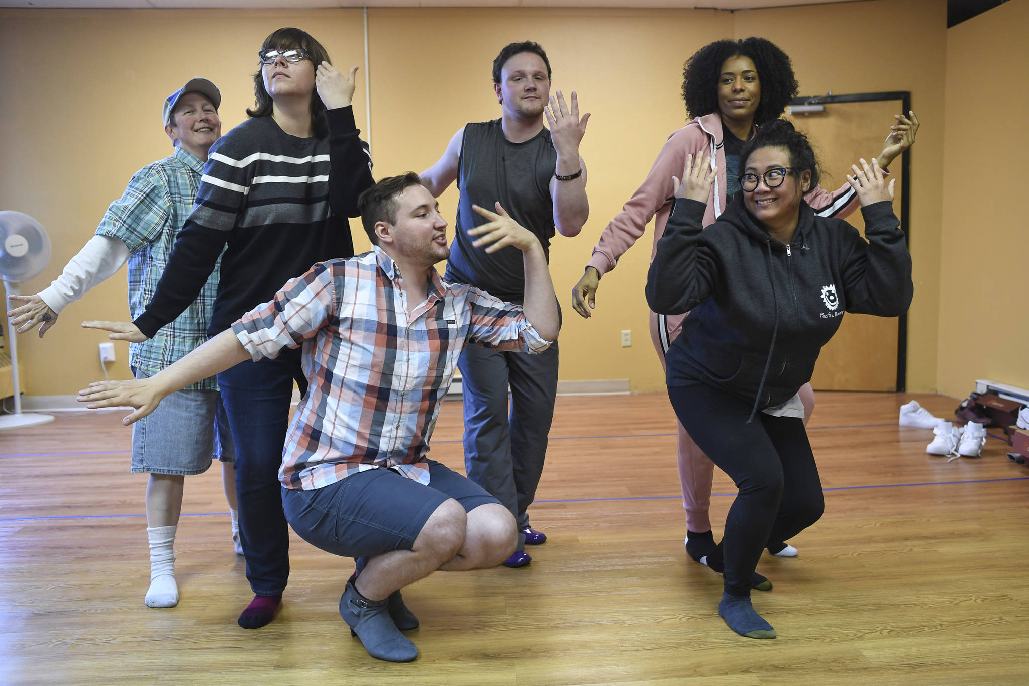 Elaine Bell, left, Heather LaVerne, Richard Carter, Mitchell Leggett, Tahir McInnis and Christianne Carrillo, right, practice for the the fifth annual GLITZ Drag Show to be held at Centennial Hall on Friday and Saturday, June 15 and 16. (Michael Penn | Juneau Empire)
