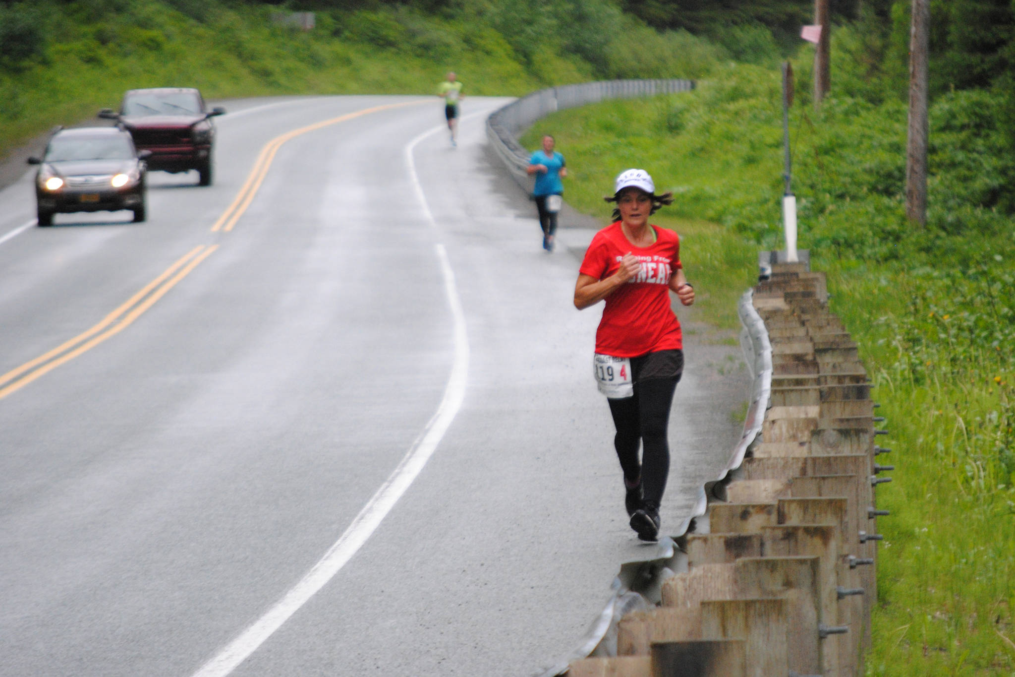 Darla Orbistondo runs the Sea Coast Relay down Glacier Highway on Saturday, June 1, 2019. The relay began at the University of Alaska Southeast and looped around the Auke Lake Trail before heading out the road to Eagle Beach State Recreation Area. (Courtesy Photo | Darla Orbistondo)