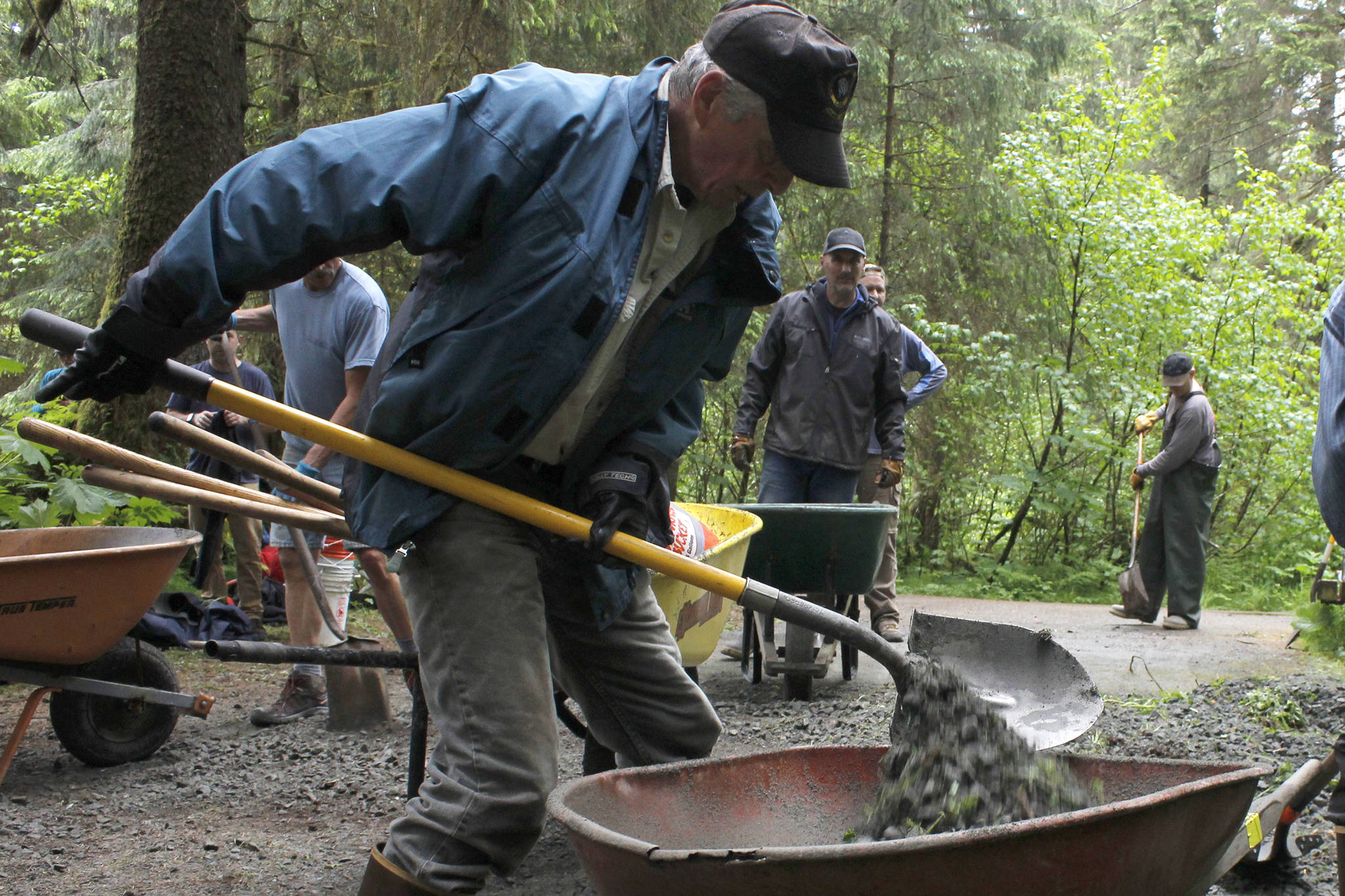 Volunteers work on the Montana Creek Trail in celebration of National Trails Day on Saturday, June 1, 2019. (Alex McCarthy | Juneau Empire)