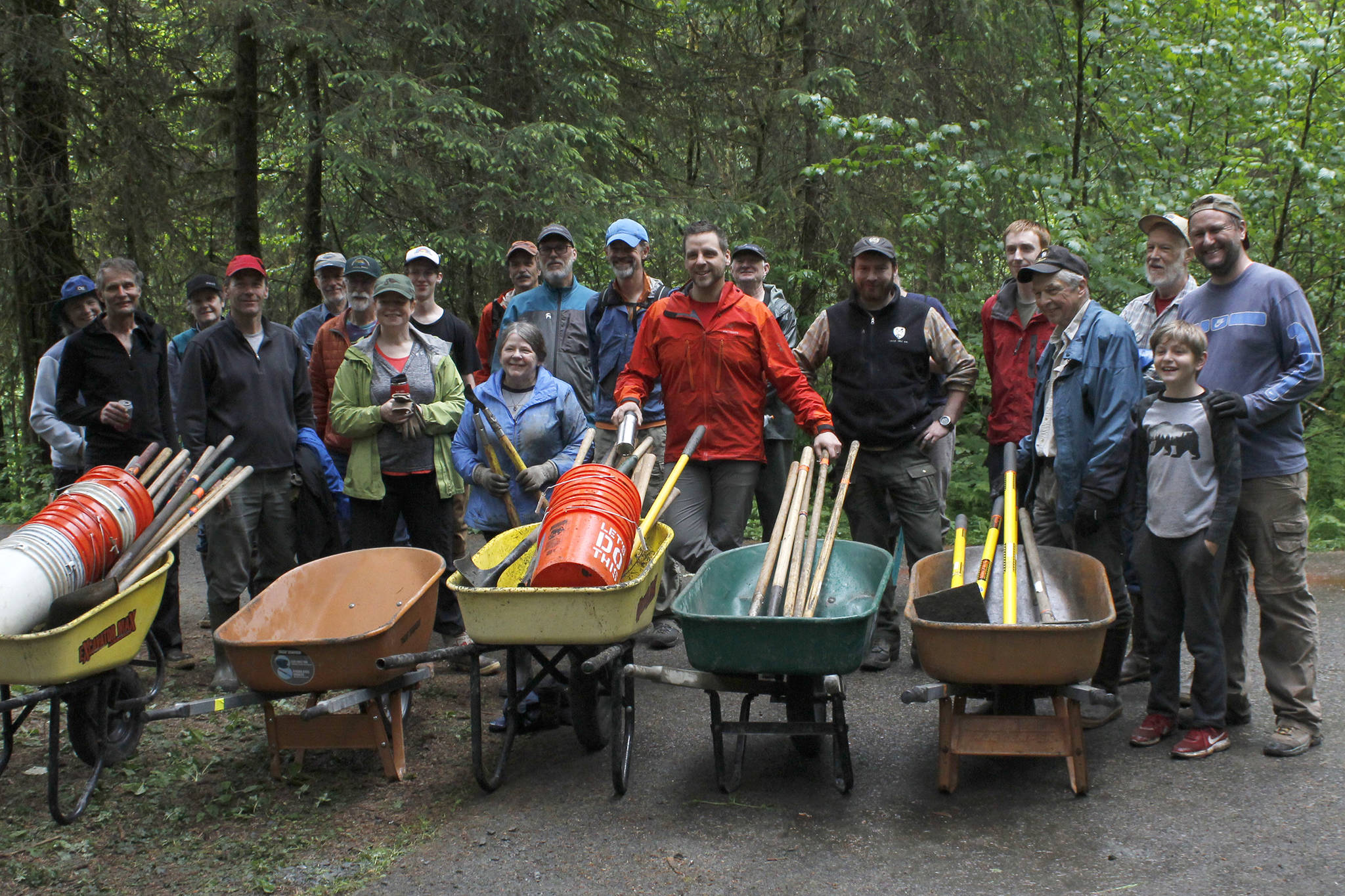 Volunteers pose for a photo after working on the Montana Creek Trail in celebration of National Trails Day on Saturday, June 1, 2019. (Alex McCarthy | Juneau Empire)
