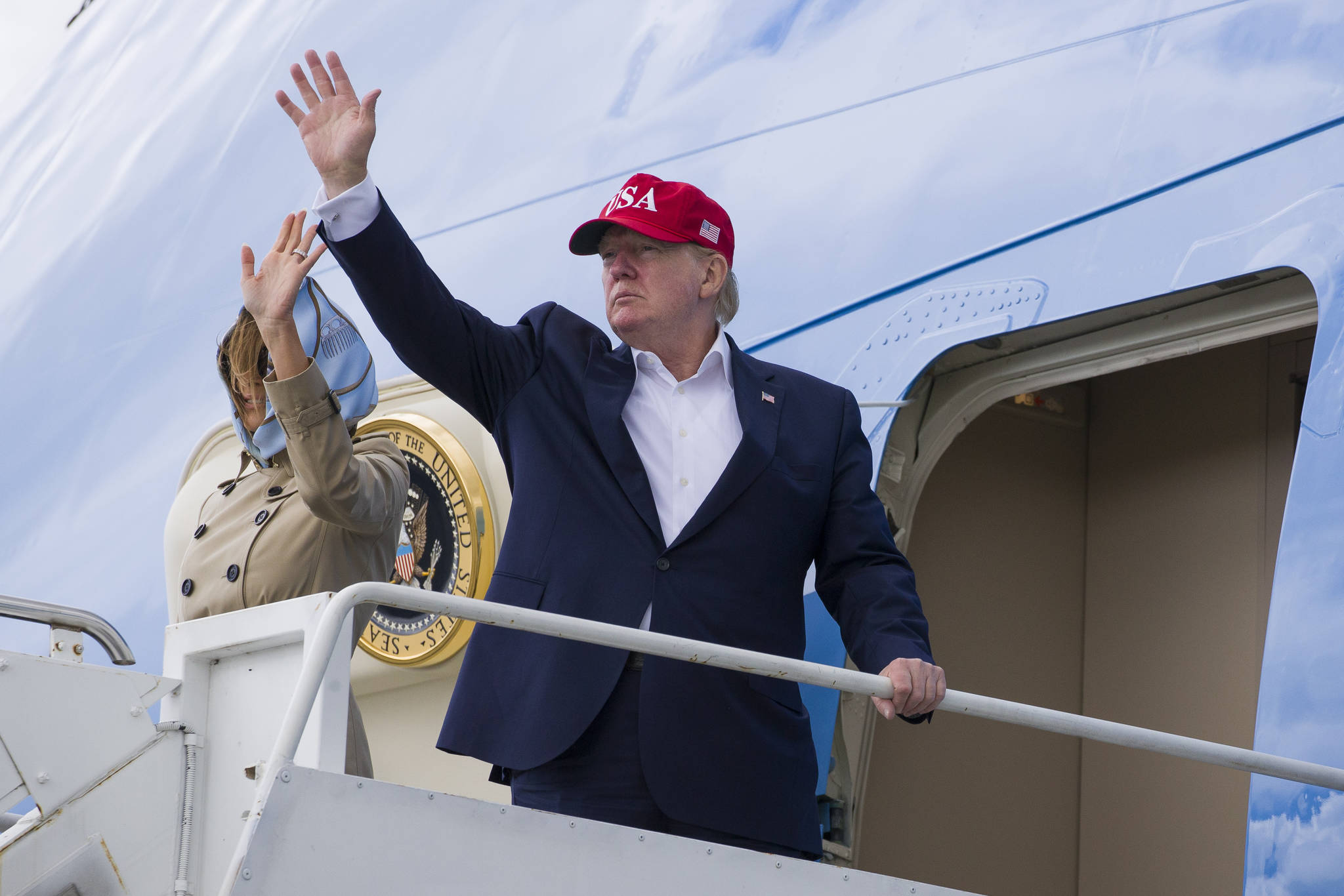 President Donald Trump, with first lady Melania Trump, waves as they depart Shannon Airport, Friday, June 7, 2019, in Shannon, Ireland. (AP Photo | Alex Brandon)