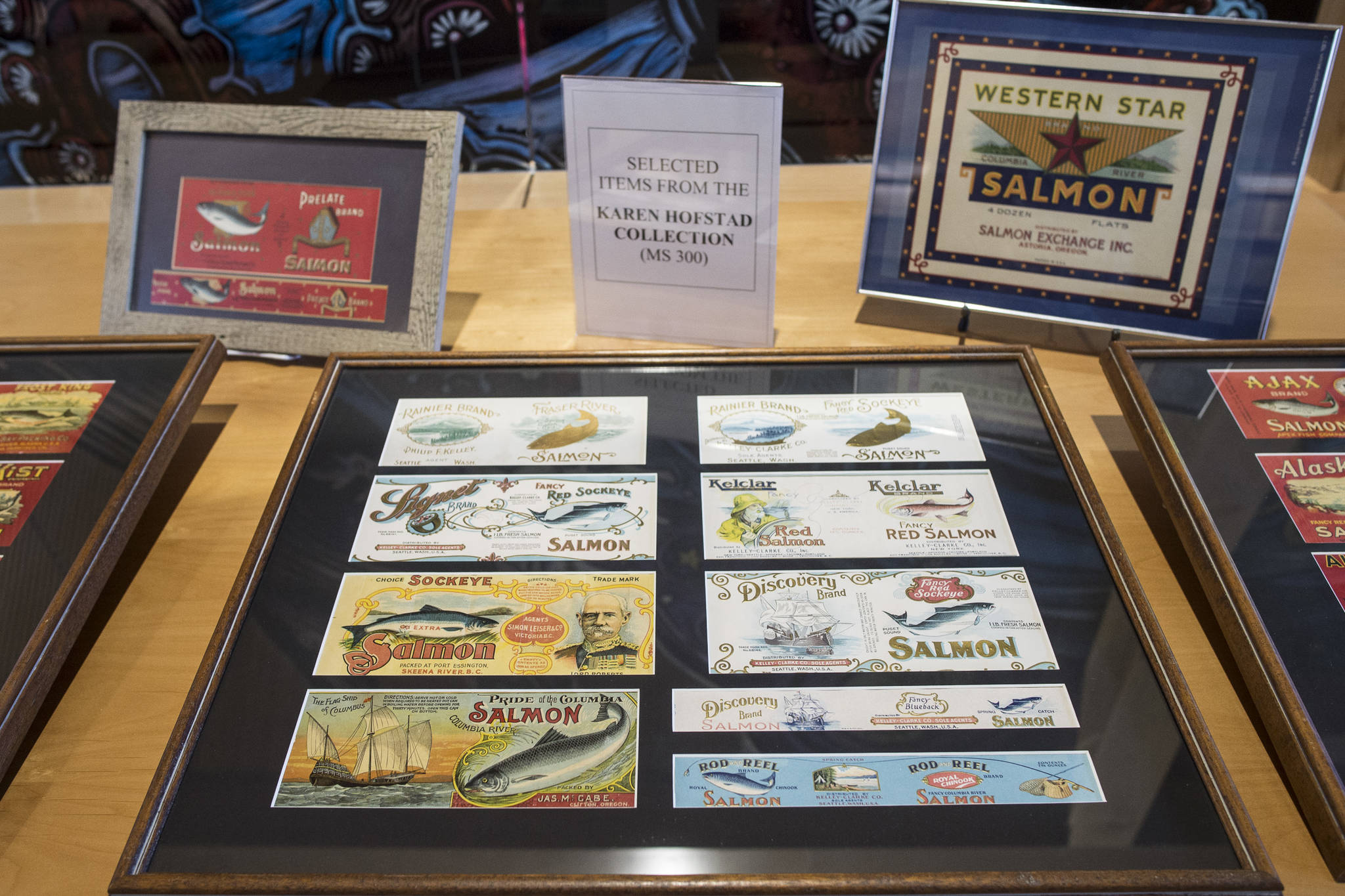 The Alaska State Library features historic salmon canneries with a collection from the Karen Hofstad at the Research Center for First Friday on Friday, June 7, 2019. (Michael Penn | Juneau Empire)