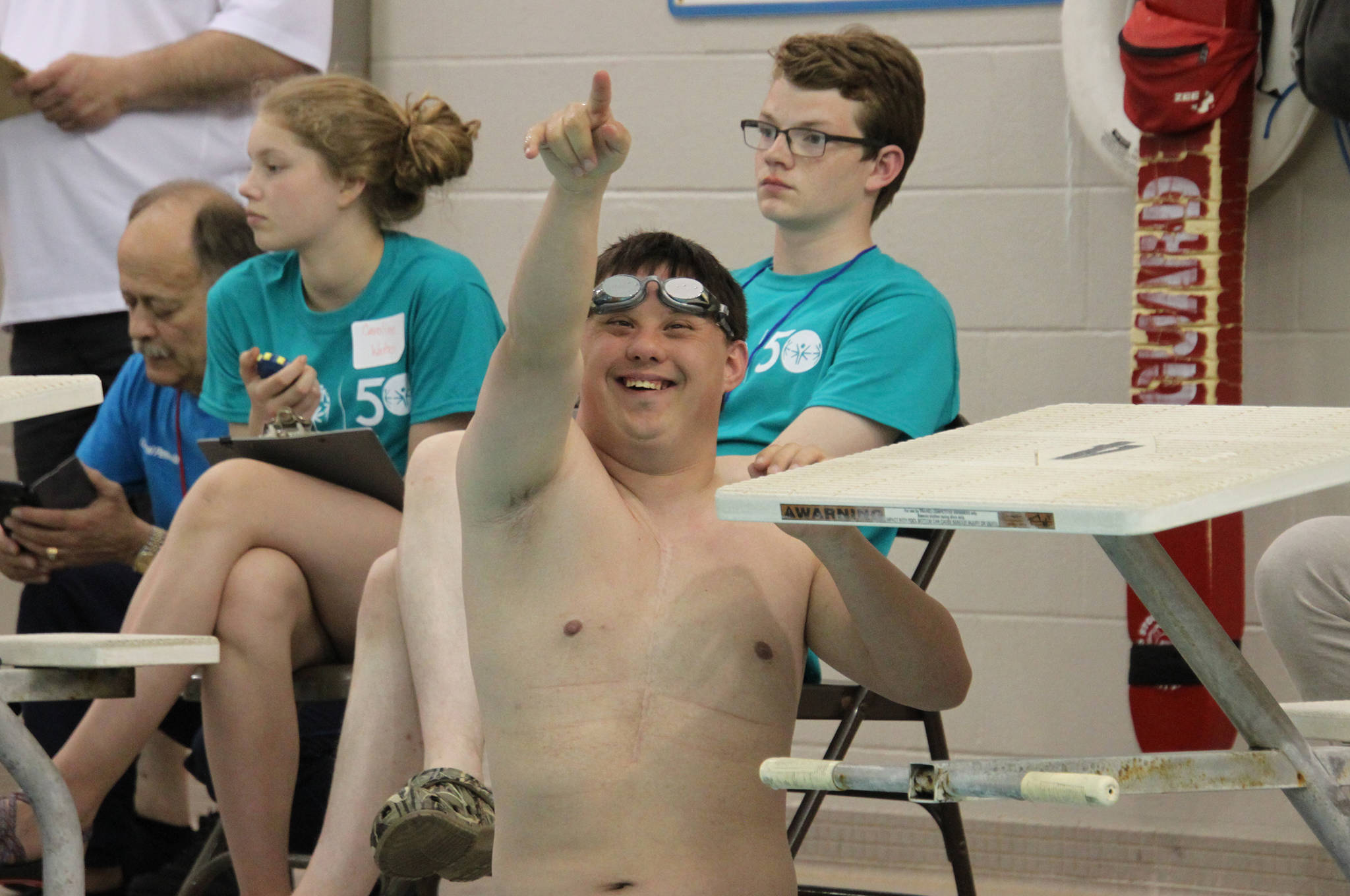 Juneau’s CJ Umbs acknowledges supporters in the stands during the aquatics events at the Special Olympics Summer Games in Anchorage on Saturday, June 8, 2019. (Courtesy Photo | Special Olympics Alaska)