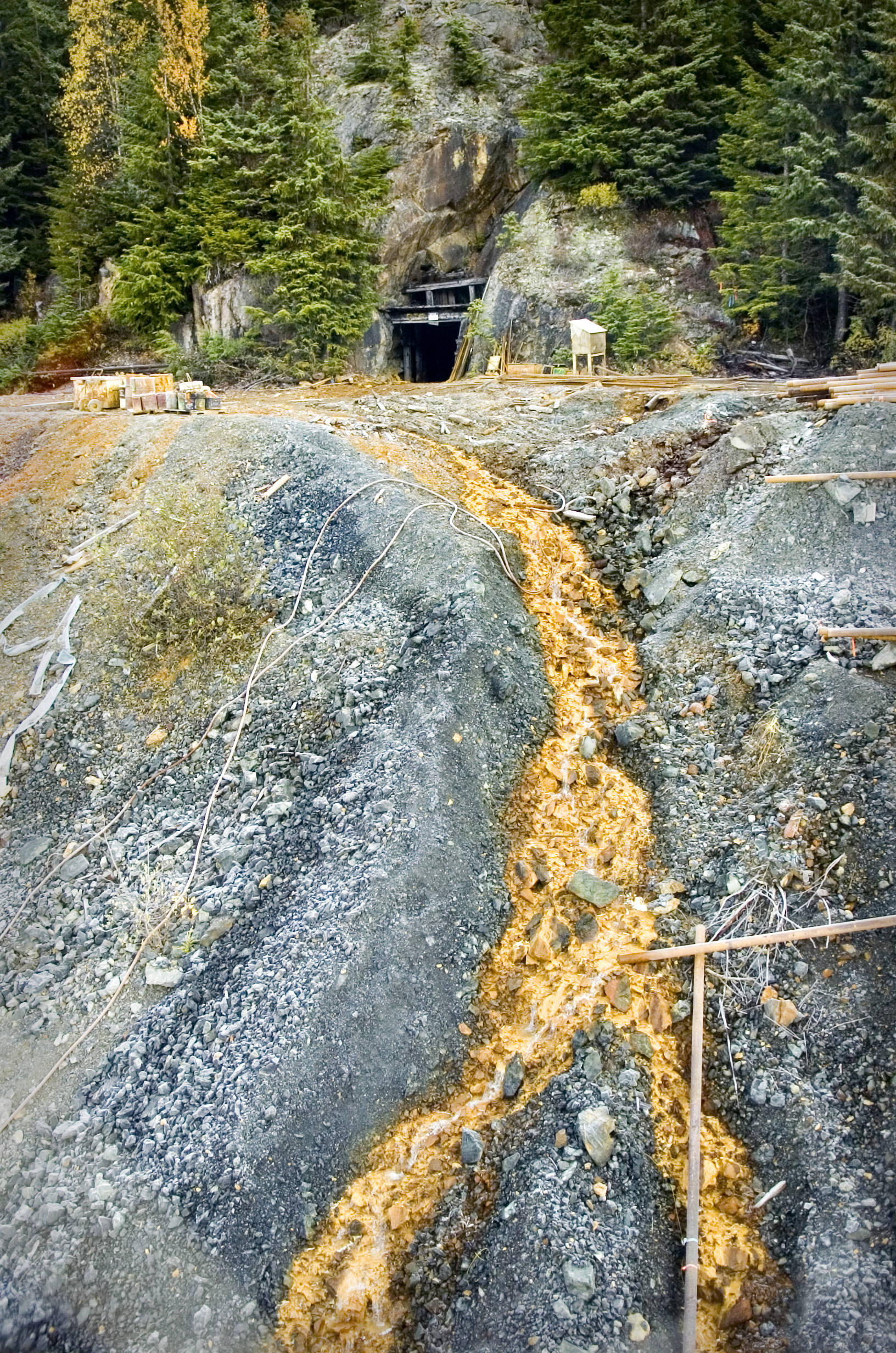 Acid contaminated water runs from the entrance of the Tulsequah Chief Mine in Canada in October 2018. Eight U.S. senators sent a letter Thursday to British Columbia, Canada’s premier asking for more transboundary water oversight. (Michael Penn | Juneau Empire)