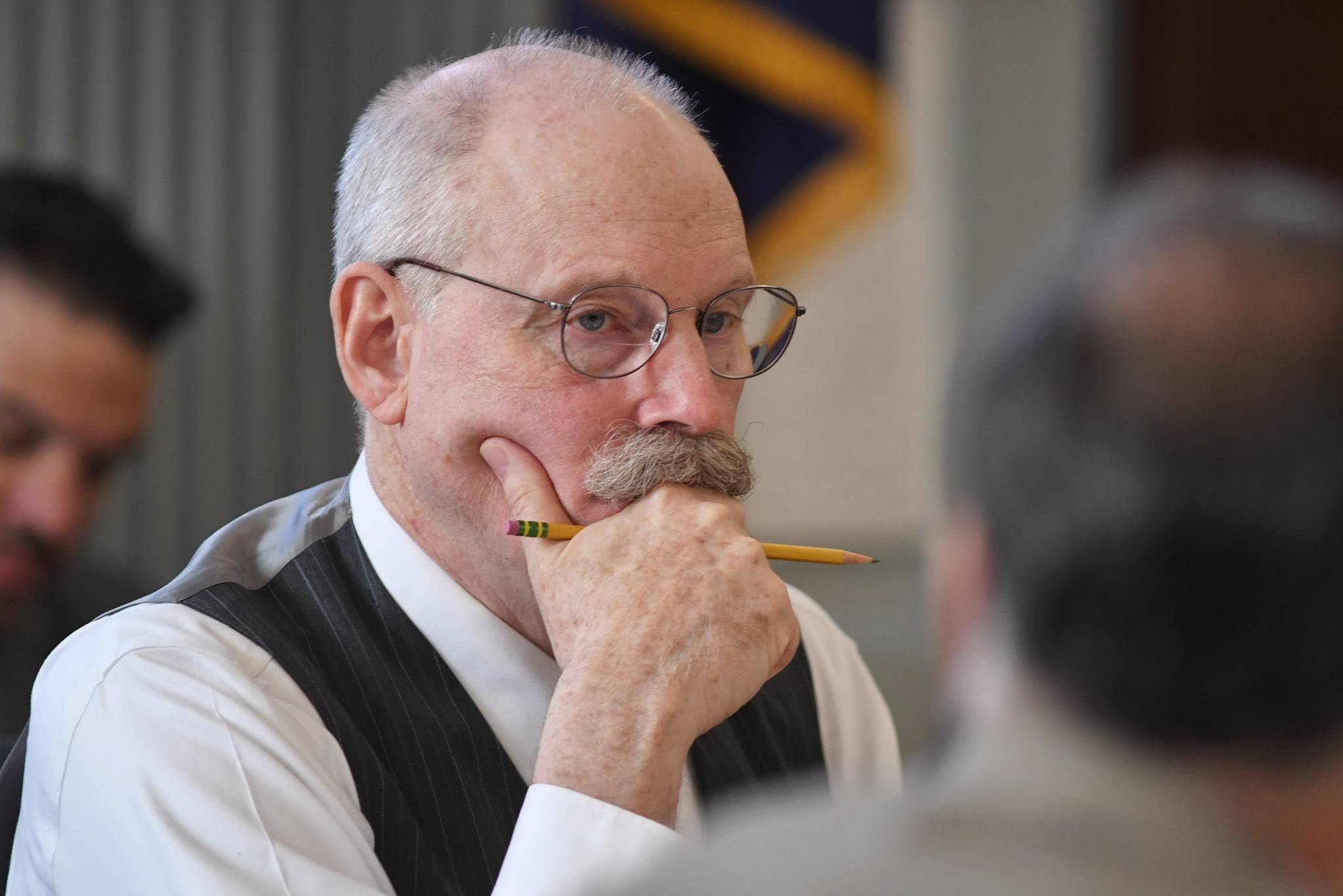 Sen. Bert Stedman, R-Sitka, listens to Finance Division Director David Teal answers questions from the Senate Finance Committee on the states budget at the Capitol on Thursday, April 25, 2019. (Michael Penn | Juneau Empire File)
