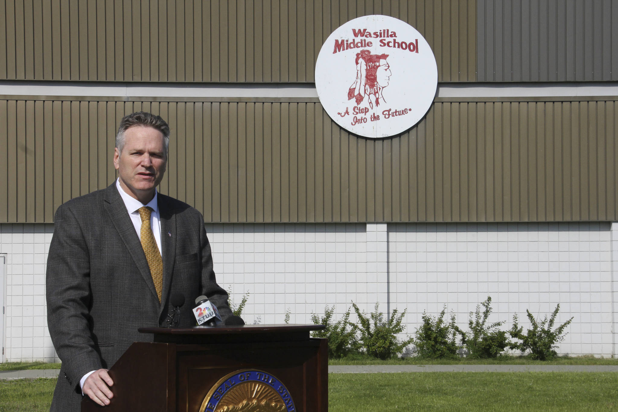 This June 14, 2019, photo shows Alaska Gov. Mike Dunleavy speaking at a news conference at Wasilla Middle School in Wasilla, Alaska. Dunleavy has called lawmakers into special session in Wasilla beginning July 8, but some lawmakers have expressed concerns over security and logistics with the location more than 500 miles from the state capital of Juneau, Alaska. (AP Photo/Mark Thiessen)