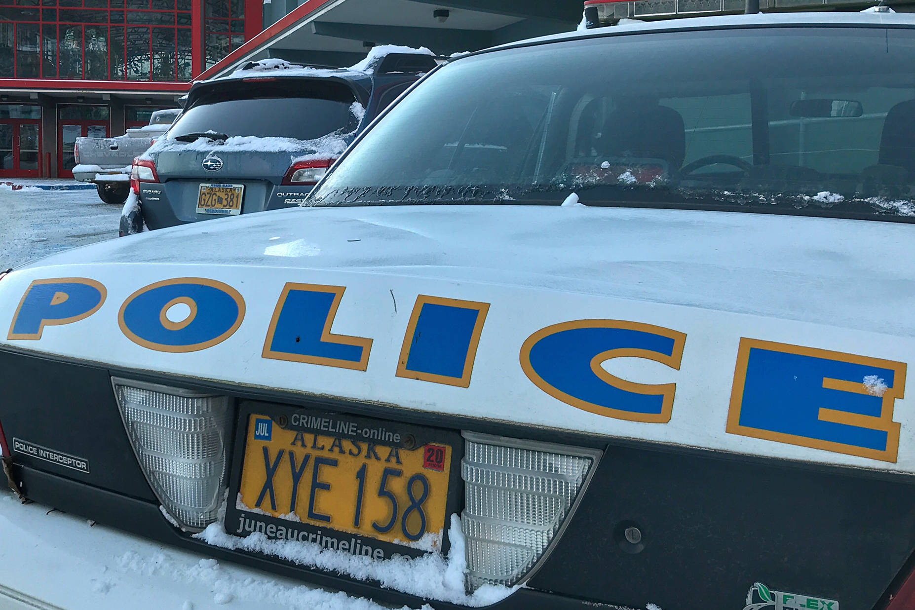 A Juneau Police Department car sits in front of Juneau-Douglas High School on Tuesday, Jan. 8, 2019. (Michael Penn | Juneau Empire File)