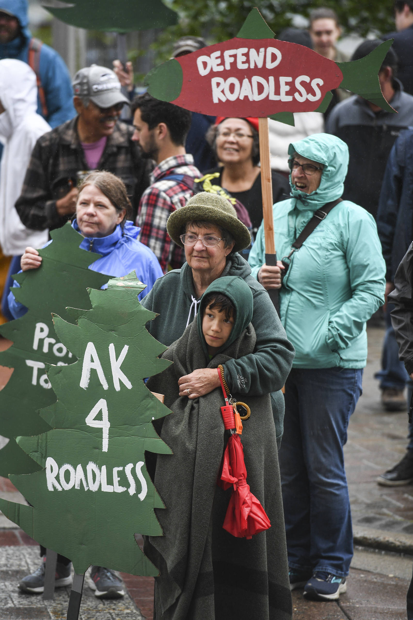 Kathy Miller and her grandson, Michael, 10, join about 150 advocates in front of the Alaska State Capitol to show local support for the 2001 National Roadless Rule during a Tongass Rally on Saturday, June 22, 2019. (Michael Penn | Juneau Empire)