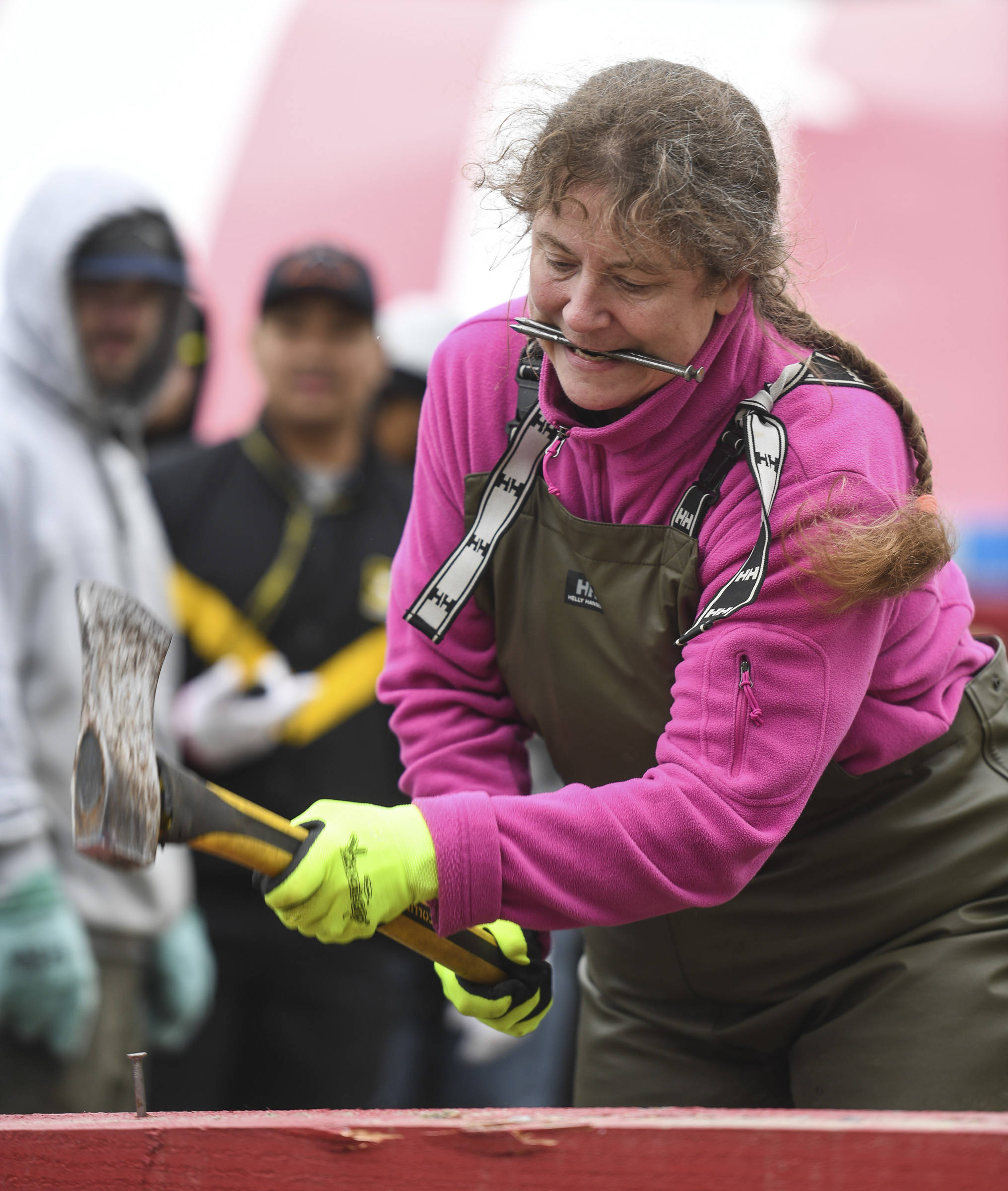 <strong>Photos by Michael Penn </strong>| Juneau Empire                                Alea Oien competes in the spike driving contest.