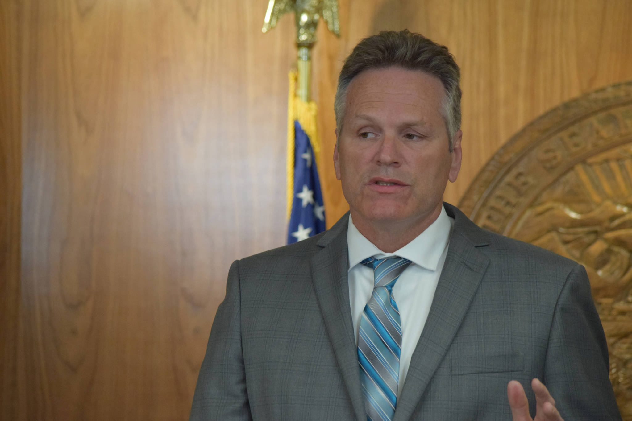 Gov. Mike Dunleavy speaks during an announcement of a budget signing and over $400 million in line-item vetoes to the Legislature’s budget, Friday, June 28, 2019. (Ben Hohenstatt | Juneau Empire)