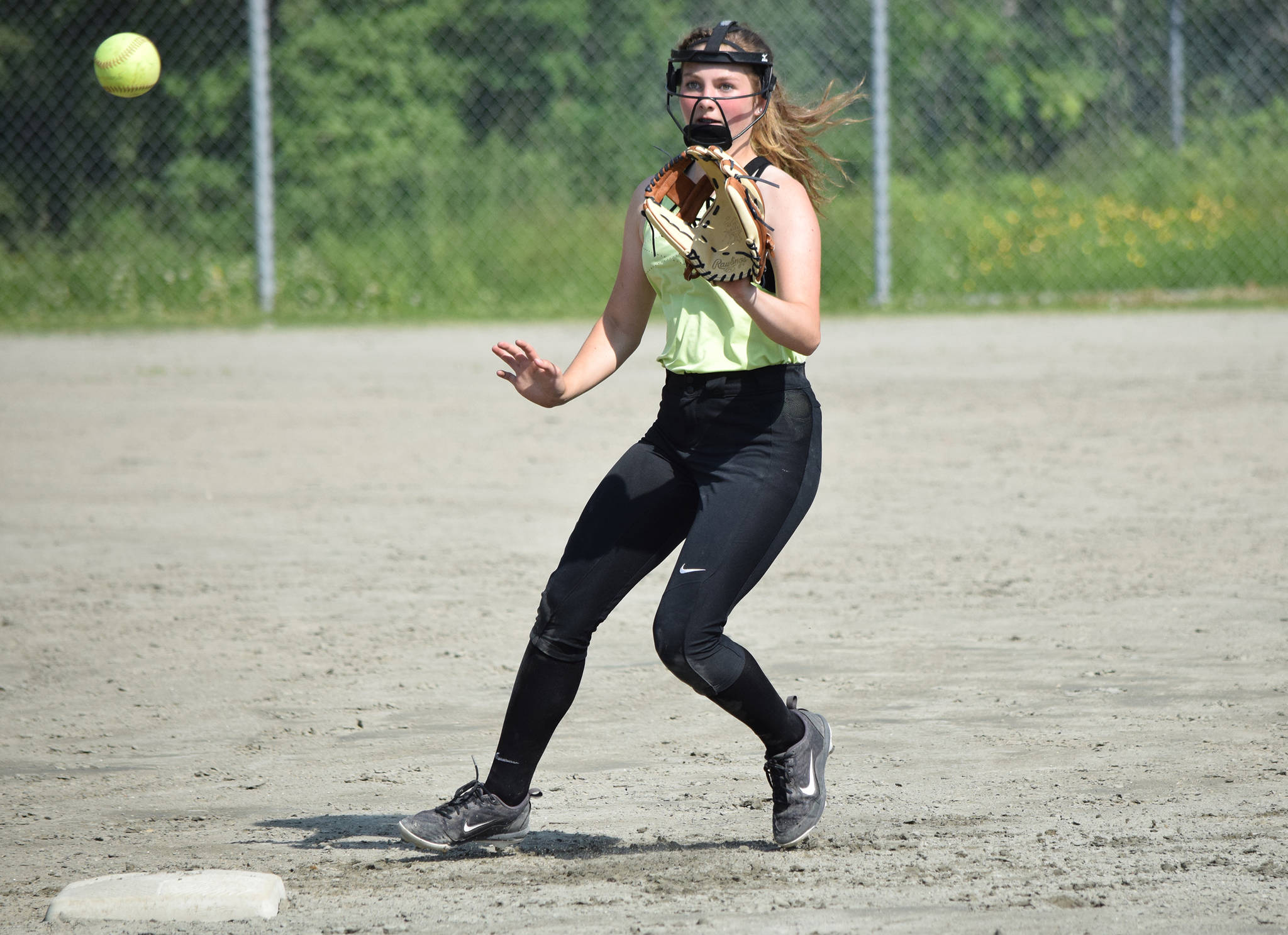 Gastineau Channel Little League all-star Gloria Bixby prepares to make a catch during team practice at Melvin Park on Saturday, June 29, 2019. Bixby is one of 13 players on the junior softball all-star team that will play in a best-of-five game series against the Ketchikan Little League all-stars beginning on Tuesday. (Nolin Ainsworth | Juneau Empire)