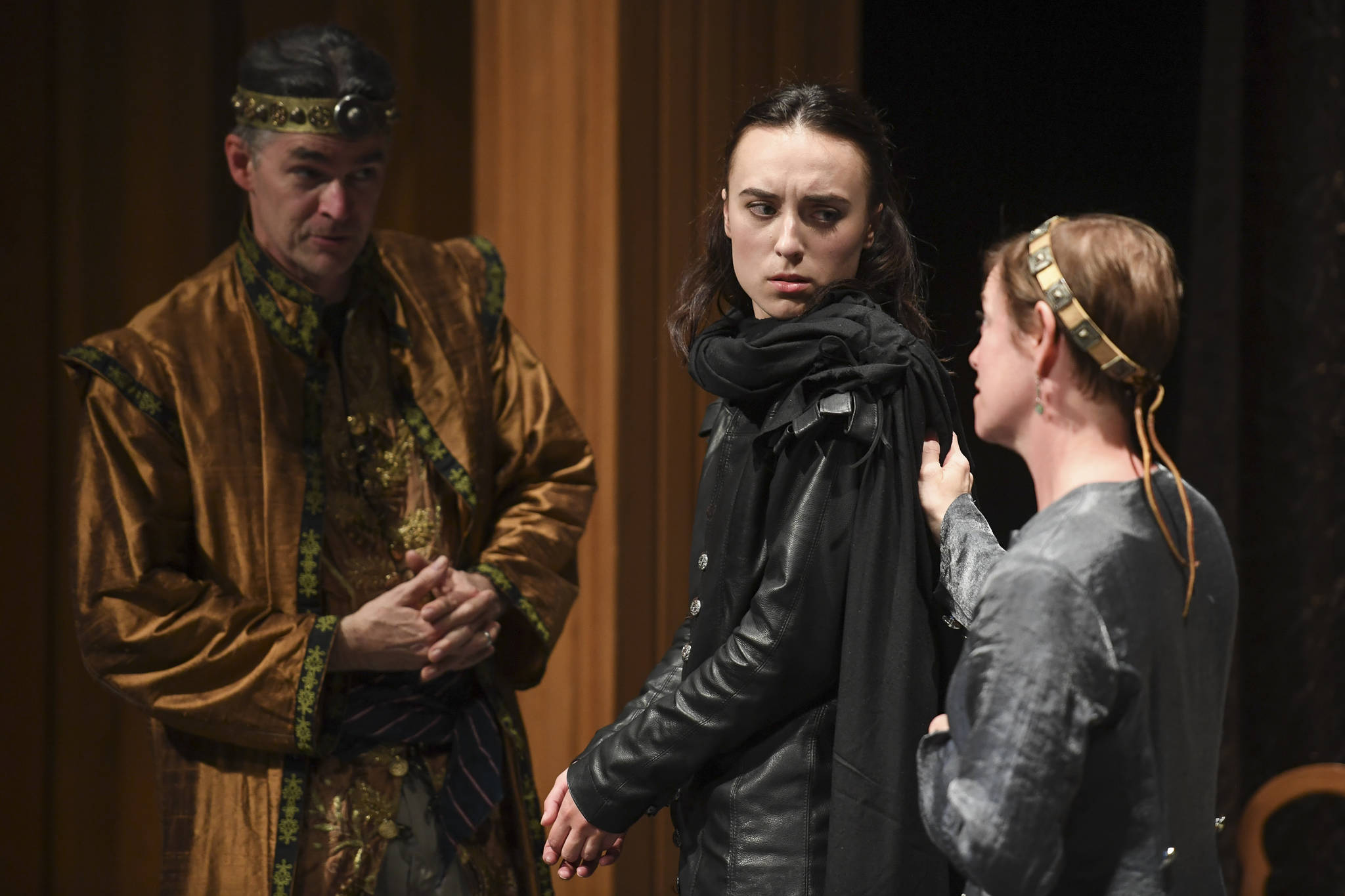 Natalia Spengler, center, plays Hamlet with Donice Gott, as his mother Gertrude, Queen of Denmark, and Aaron Elmore as Claudius, King of Denmark, during a performance of William Shakespeare’s “Hamlet” by Theatre in the Rough at McPhetres Hall on Tuesday, July 2, 2019. (Michael Penn | Juneau Empire)