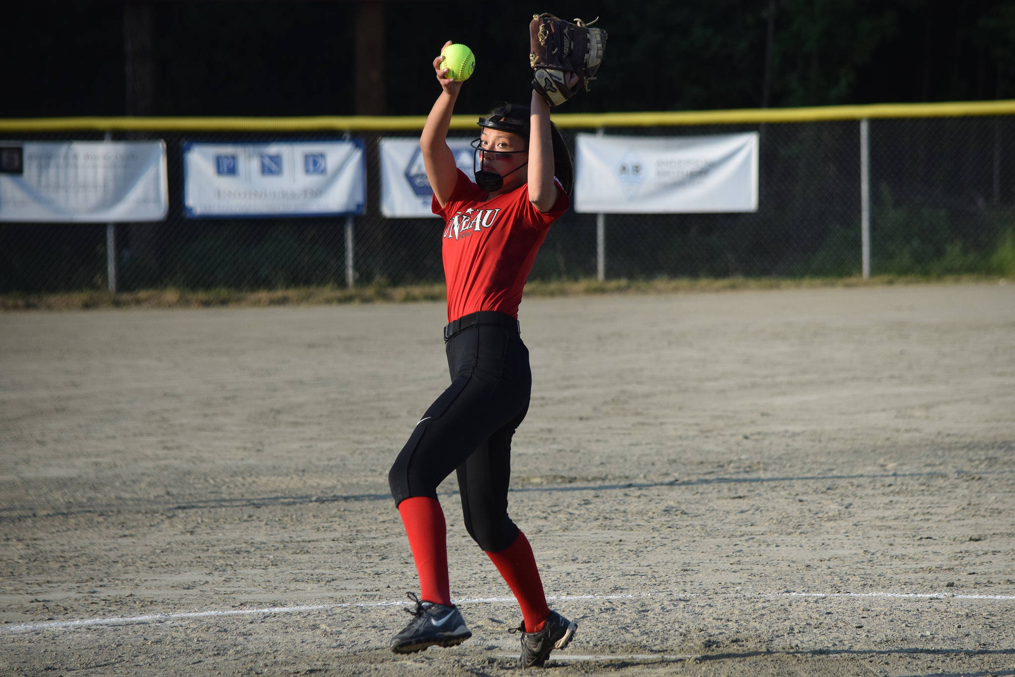 Juneau All-Stars pitcher Kiah Yadao pitches in the first inning against Ketchikan in Game 3 of the Alaska Junior Softball District 2 Tournament at Melvin Park on Wednesday, July 3, 2019. Juneau swept the best-of-five-game series, winning 17-16 on Tuesday and 14-4 and 11-0 in a doubleheader on Wednesday. (Nolin Ainsworth | Juneau Empire)