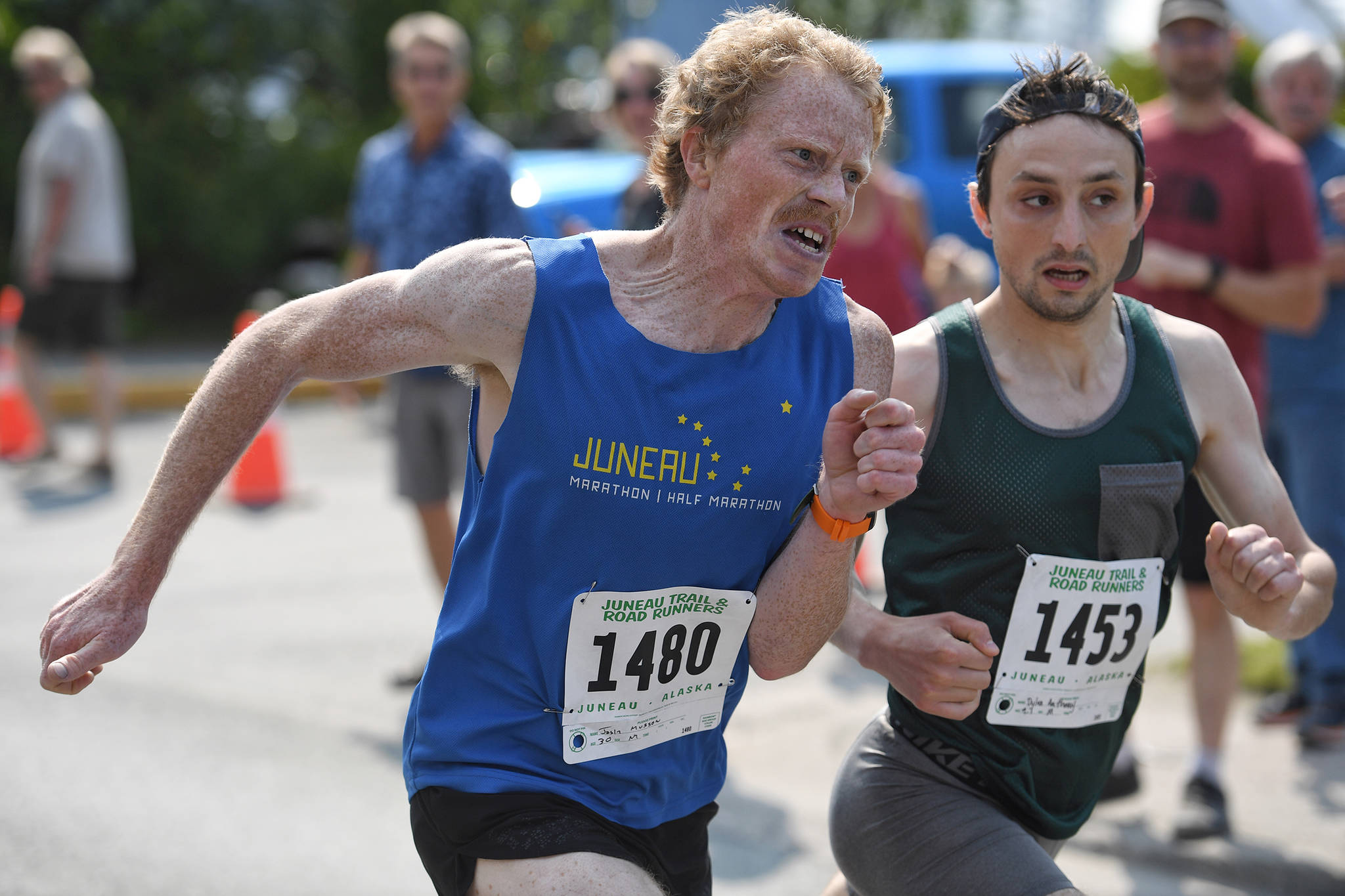 Joshua Musson, left, Dylan Anthony sprint to the finish In the Glenn Frick Race for second place on Thursday, July 4, 2019. (Michael Penn | Juneau Empire)