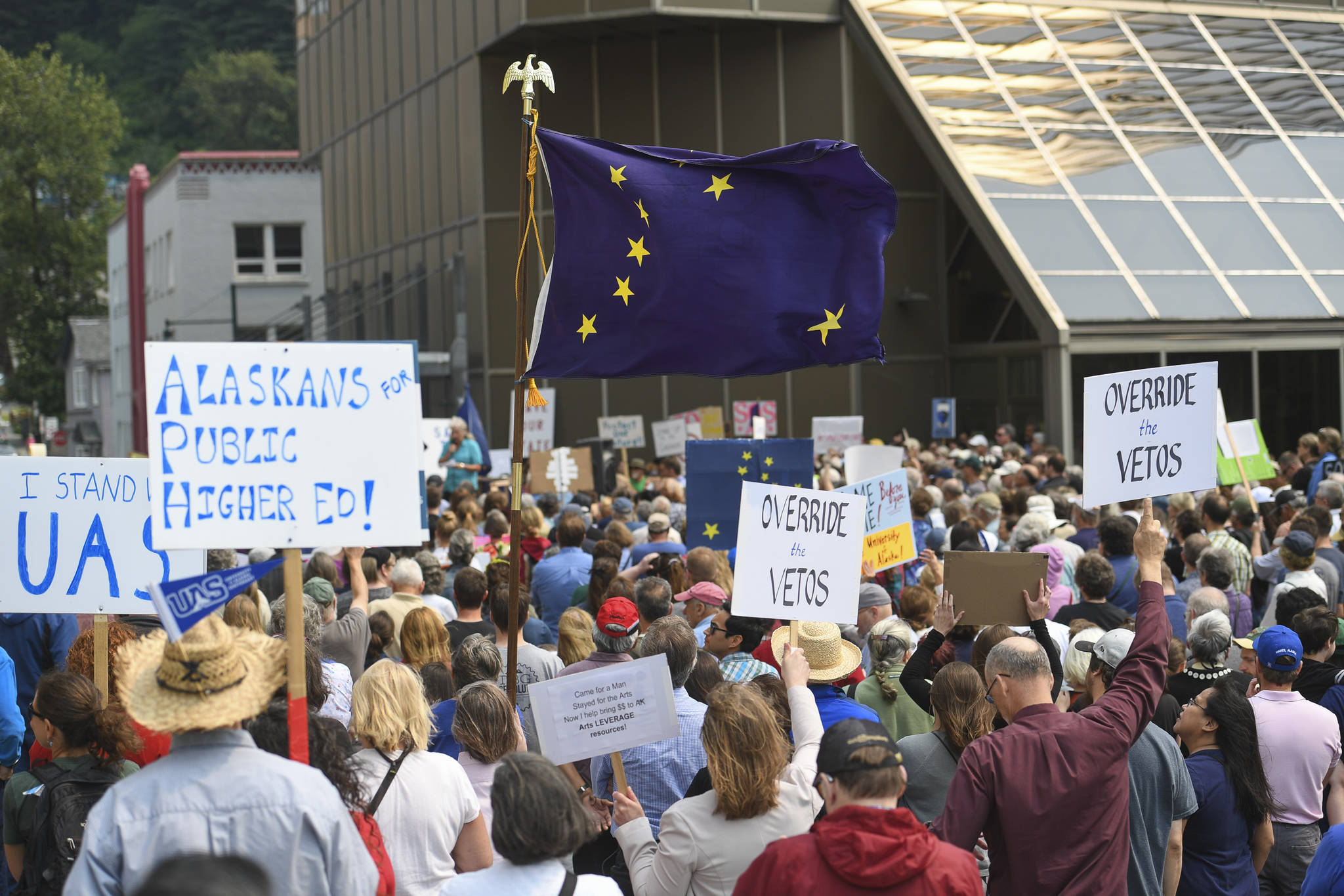 Hundreds attend a rally in front of the Capitol calling for an override of Gov. Mike Dunleavy’s budget vetos on the first day of the Second Special Session of the Alaska Legislature in Juneau on Monday, July 8, 2019. (Michael Penn | Juneau Empire)