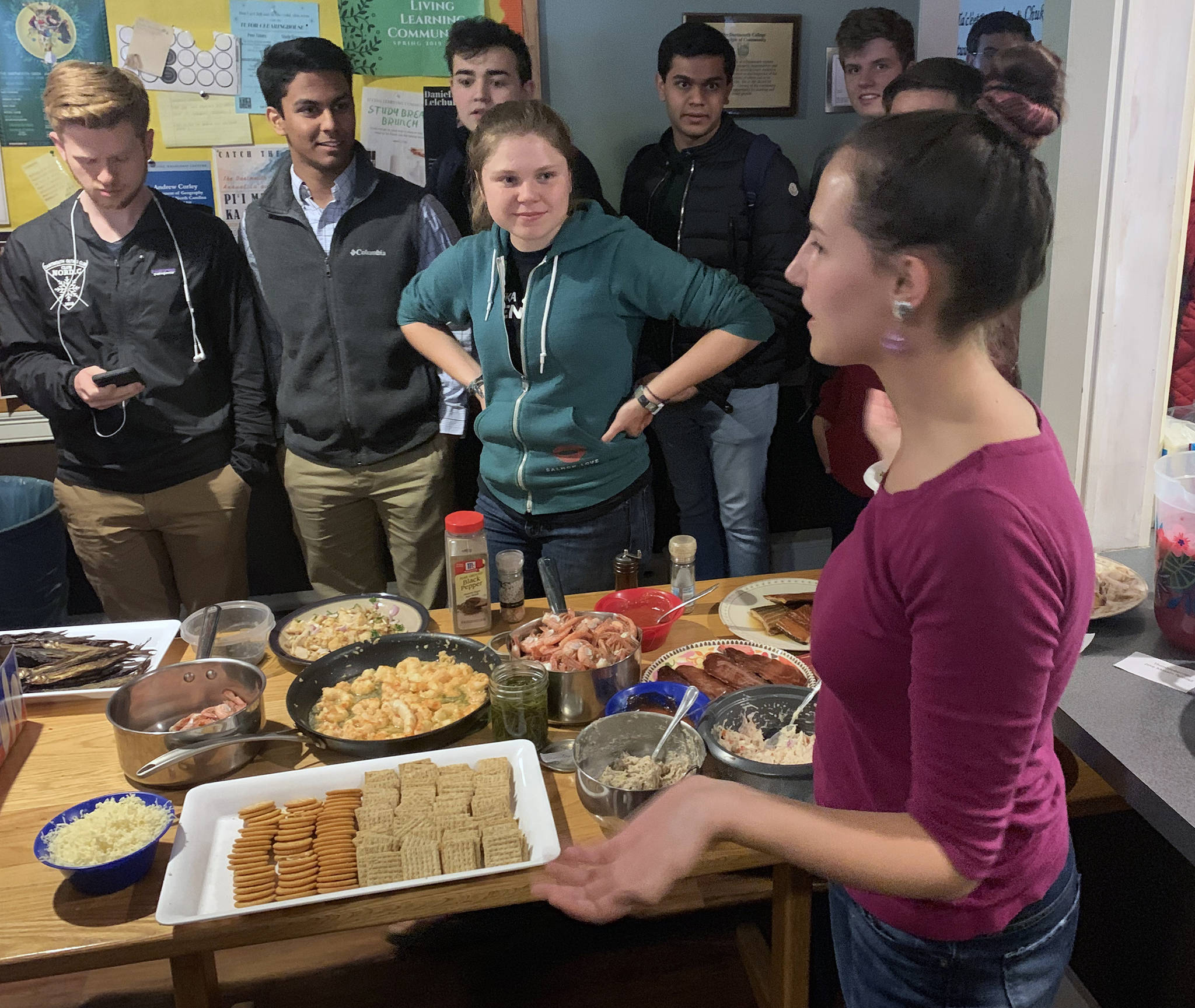 Maleah Wenzel explains traditional Alaska foods to guests at the Aurora Club at Darmouth College on May 1, 2019. (Courtesy photo | Dartmouth Aurora Club)