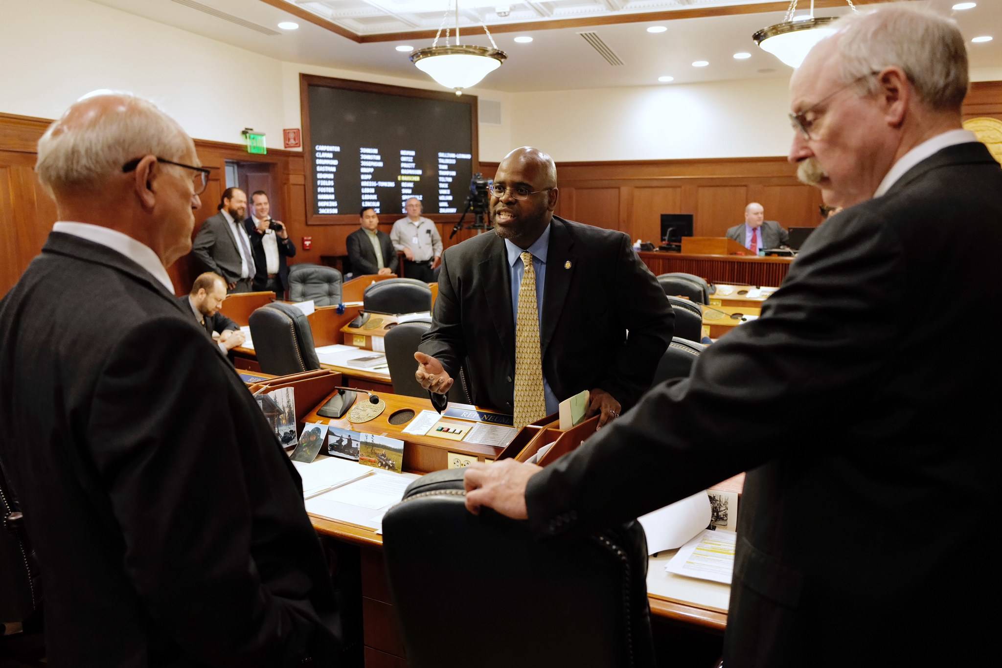 Sen. David Wilson, R-Wasilla, center, has a heated discussion with Sen John Coghill, R-North Pole, left, as Sen. Bert Stedman, R-Sitka, listens as they meet for a continued Joint Session of the Alaska Legislature at the Capitol on Thursday, July 11, 2019. (Michael Penn | Juneau Empire)