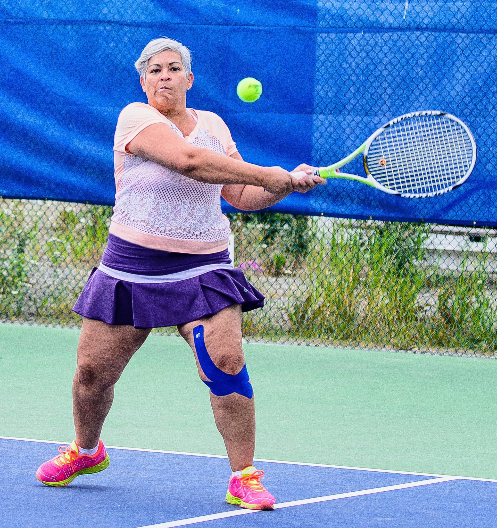 Carmen Cintron of Juneau winds up for a hit during the Capital Cup at the Mount McIntyre Courts in Whitehorse, Yukon, on Saturday, July 13, 2019. Whitehorse beat Juneau 464-415 in the three-day tennis competition between the sister cities. It was the 21st time the event has taken place after beginning in 1983. (Courtesy Photo | Dennis Senger)