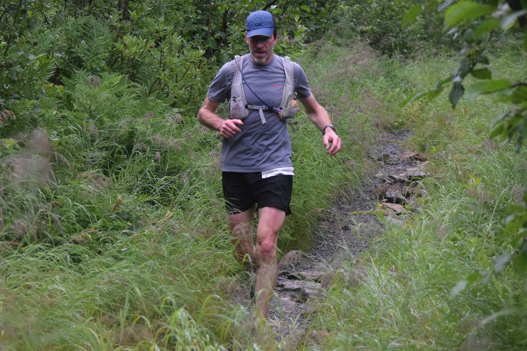 Franz Mueter descends from Mount Juneau along Granite Creek Trail while competing in the Juneau Ridge Race on Saturday, July 20, 2019. Over 60 runners participated in the 15-mile mountain running race that featured approximately 5,000 feet of elevation gain. (Nolin Ainsworth | Juneau Empire)