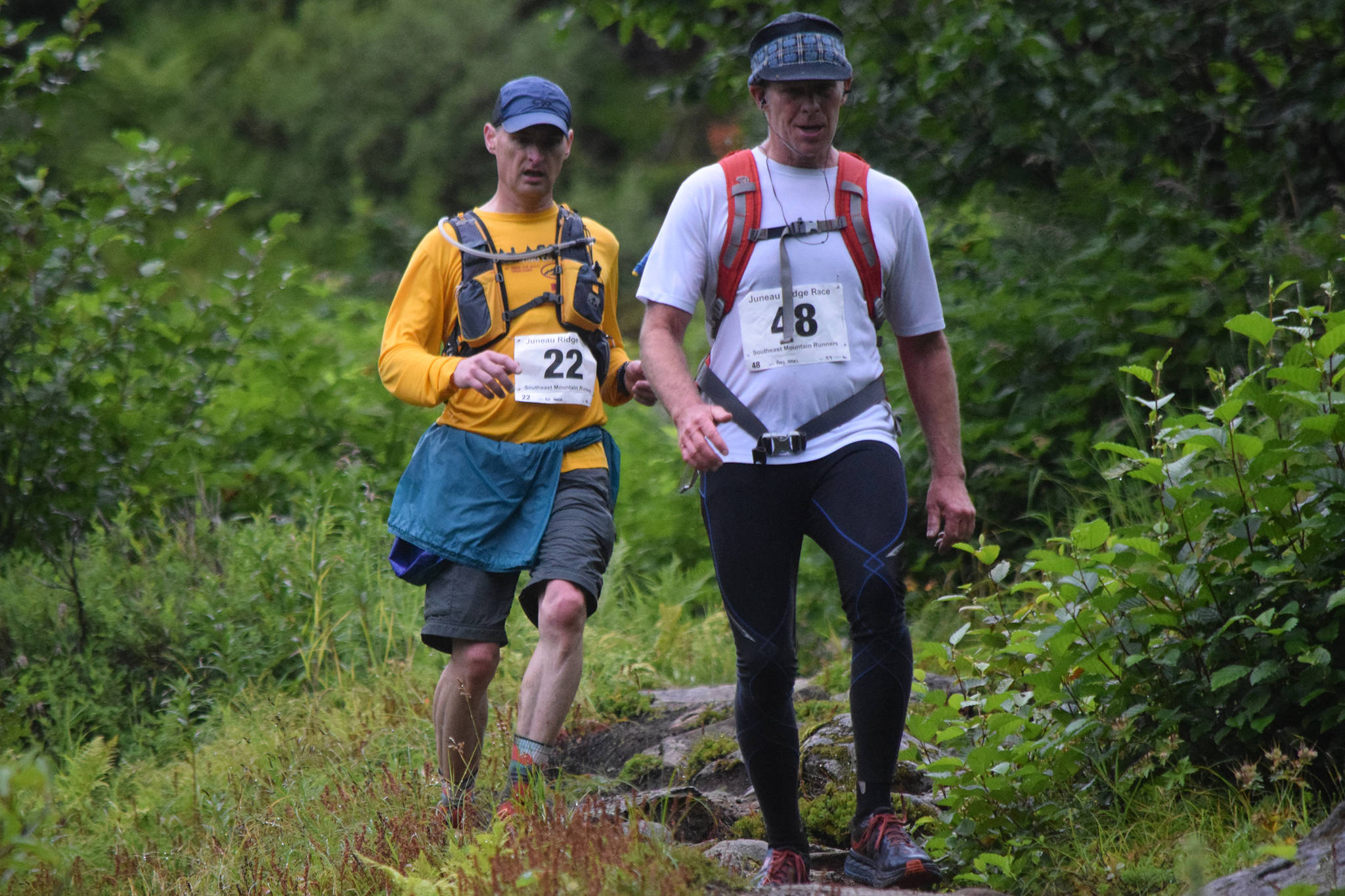 Ed Hand, left, and Ray Imel descends from Mount Juneau along Granite Creek Trail while competing in the Juneau Ridge Race on Saturday, July 20, 2019. Over 60 runners participated in the 15-mile mountain running race that featured approximately 5,000 feet of elevation gain. (Nolin Ainsworth | Juneau Empire)