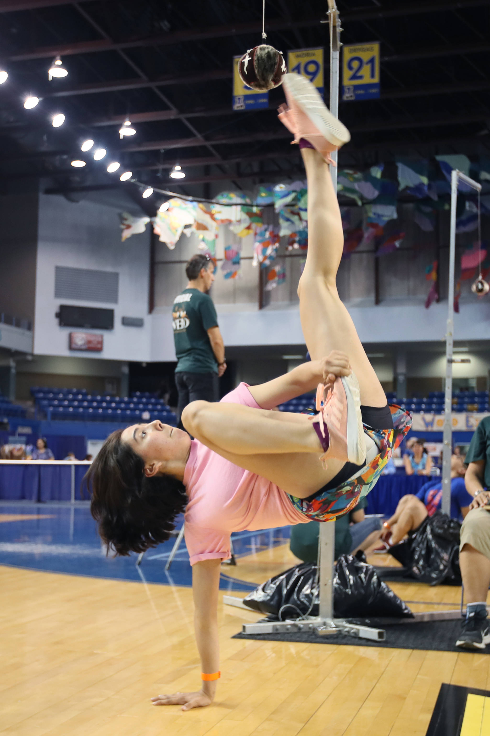 Sara Steeves of Juneau competes in the Alaskan high kick at the World-Eskimo Indian Olympics at the Carlson Center in Fairbanks on July 18, 2019. Steeves won a gold medal in the event with her kick of 72 inches. (Greg Lincoln | For the Juneau Empire)