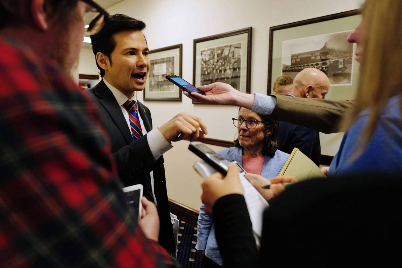 House Finance Committee Co-Chairs Neal Foster, D-Nome, and Jennifer Johnston, R-Anchorage, speaks to members of the media during an at ease in a House session at the Capitol on Wednesday, July 24, 2019. (Michael Penn | Juneau Empire)