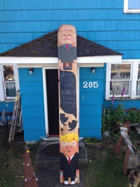 Sitka artist Tommy Joseph recently carved a totem pole shaming Gov. Mike Dunleavy, top, and President Donald Trump, bottom. Joseph said he would like to bring the pole to Juneau. (Courtesy photo | Kristina Cranston)