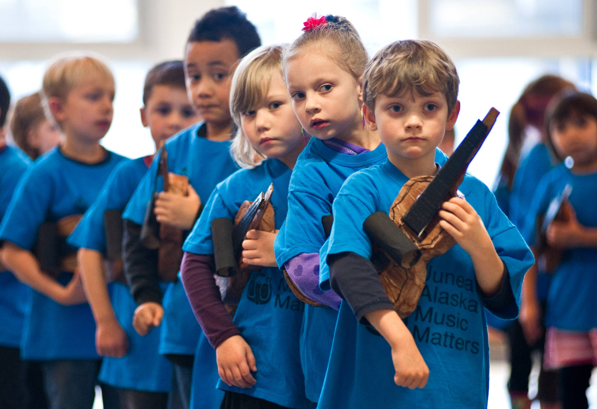 In this November 2013 photo, kindergartners give looks of anticipation before their first Kindergarten Paper Violin Concert at Glacier Valley Elementery School Wednesday. The concert showcased the efforts of Juneau, Alaska Music Matters, which recently was awarded a $10,000 grant. (Michael Penn | Juneau Empire File)