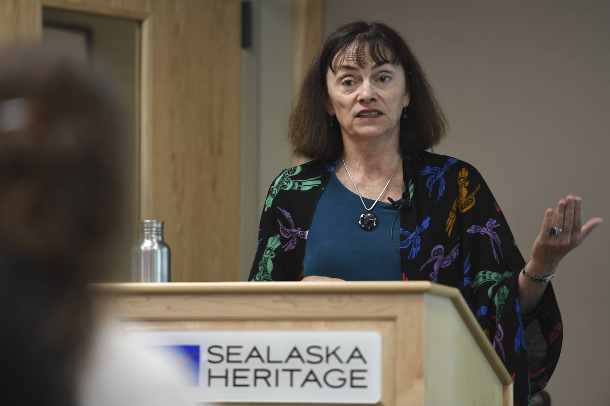 Dr. Madonna Moss, professor of anthropological archaeology at the University of Oregon, speaks on Tlingit relationships with sea otters and whether Tlingit people consumed sea otters as food in the past during a lecture at the Walter Soboleff Center on Friday, Aug. 2, 2019. (Michael Penn | Juneau Empire)