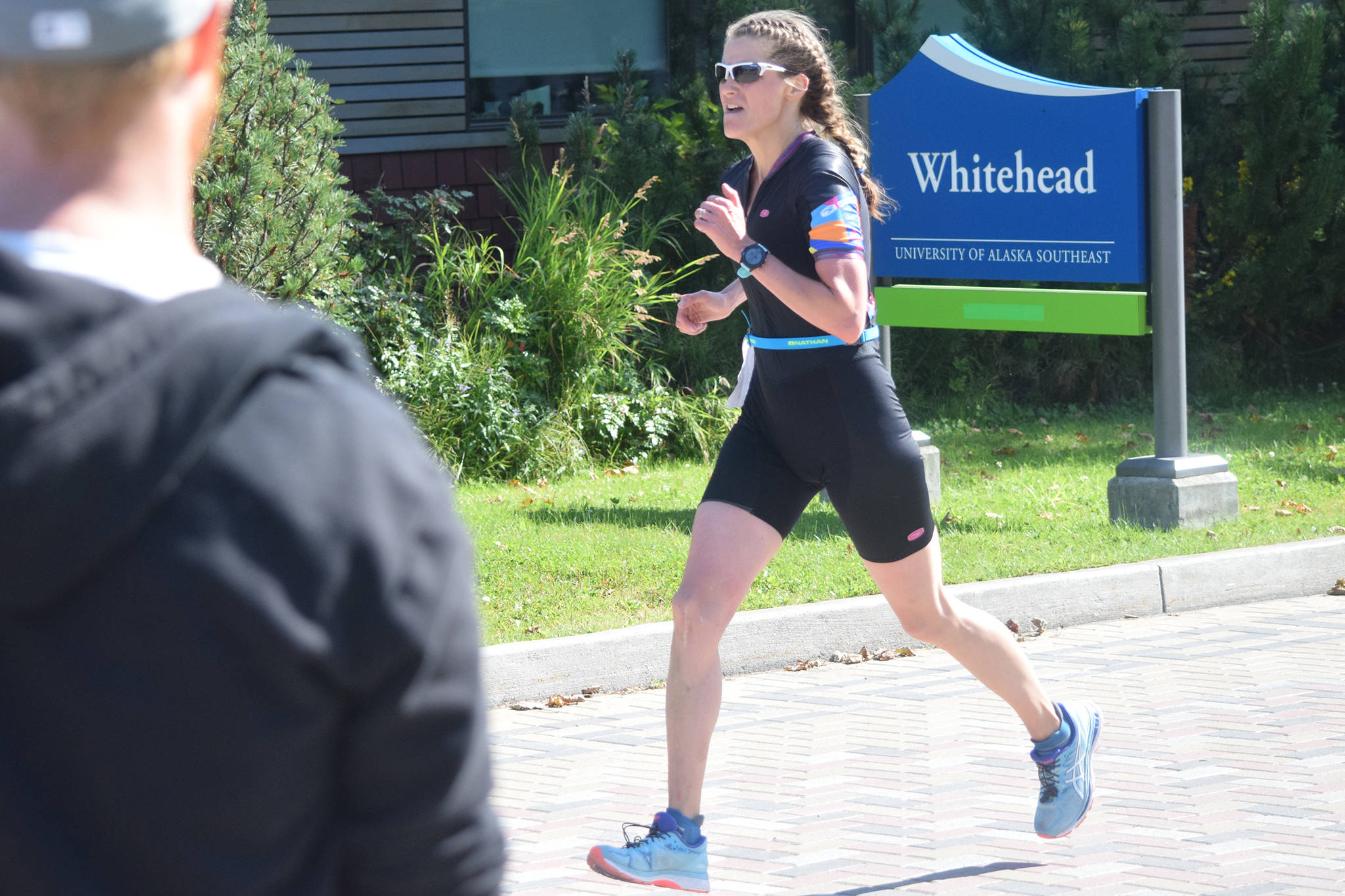 Eliza Dorn approaches the finish line while competing in 2019 Aukeman Triathon on Saturday, Aug. 3, 2019. Dorn and her her husband, Justin, won the men’s and women’s titles in the Aukeman’s Olympic distance race. (Nolin Ainsworth | Juneau Empire)