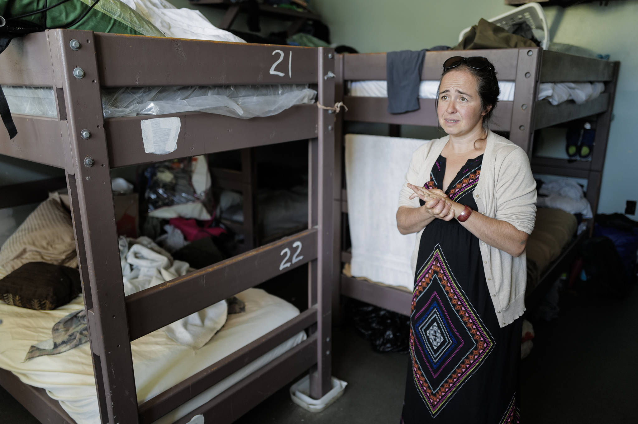 Mariya Lovishchuk, Executive Director of the Glory Hall — Juneau’s homeless shelter and soup kitchen, stands in one of the two men’s dormitories as she talks about the crowded conditions at their current location on South Franklin Street on Tuesday, Aug. 6, 2019. Fundraising is currently underway to buy property in the airport area for a new facility. (Michael Penn | Juneau Empire)