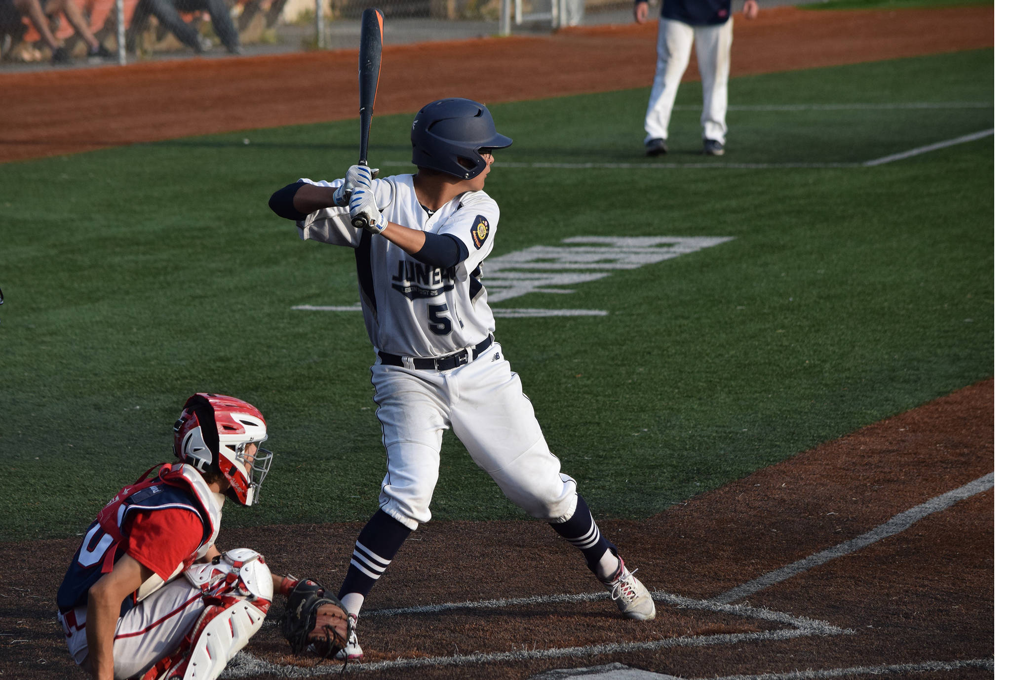 Juneau Post 25’s Oliver Mendoza bats against Wasilla Post 35 in the American Legion Alaska state championship game on Tuesday, July 30, 2019, at Mulcahy Stadium in Anchorage. (Nolin Ainsworth | Juneau Empire)
