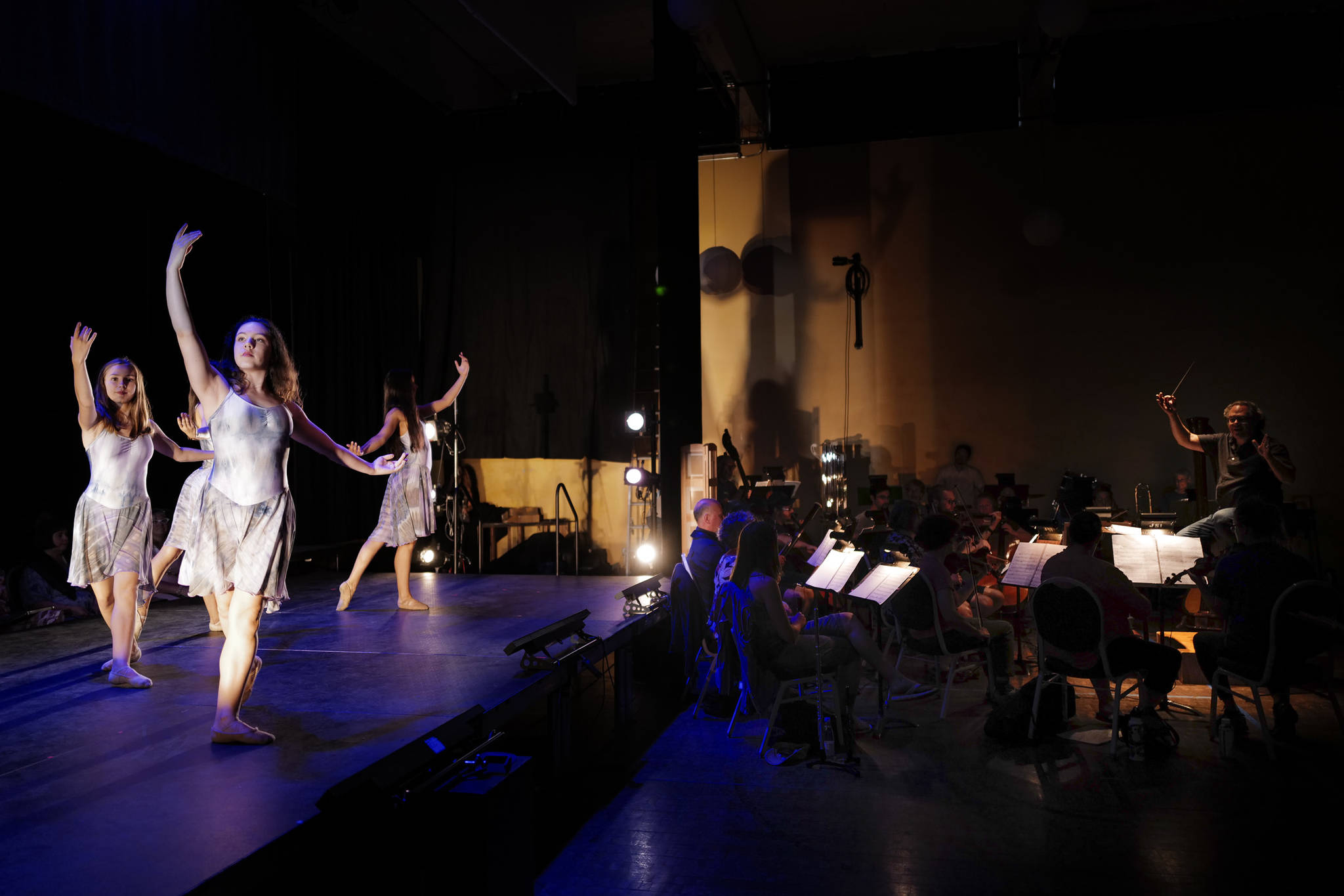 Dancers take to the stage as the Juneau Lyric Opera rehearses Composer Pietro Mascagni’s Cavalleria Rusticana at the Juneau Arts and Culture Center on Monday, Aug. 12, 2019. (Michael Penn | Juneau Empire)