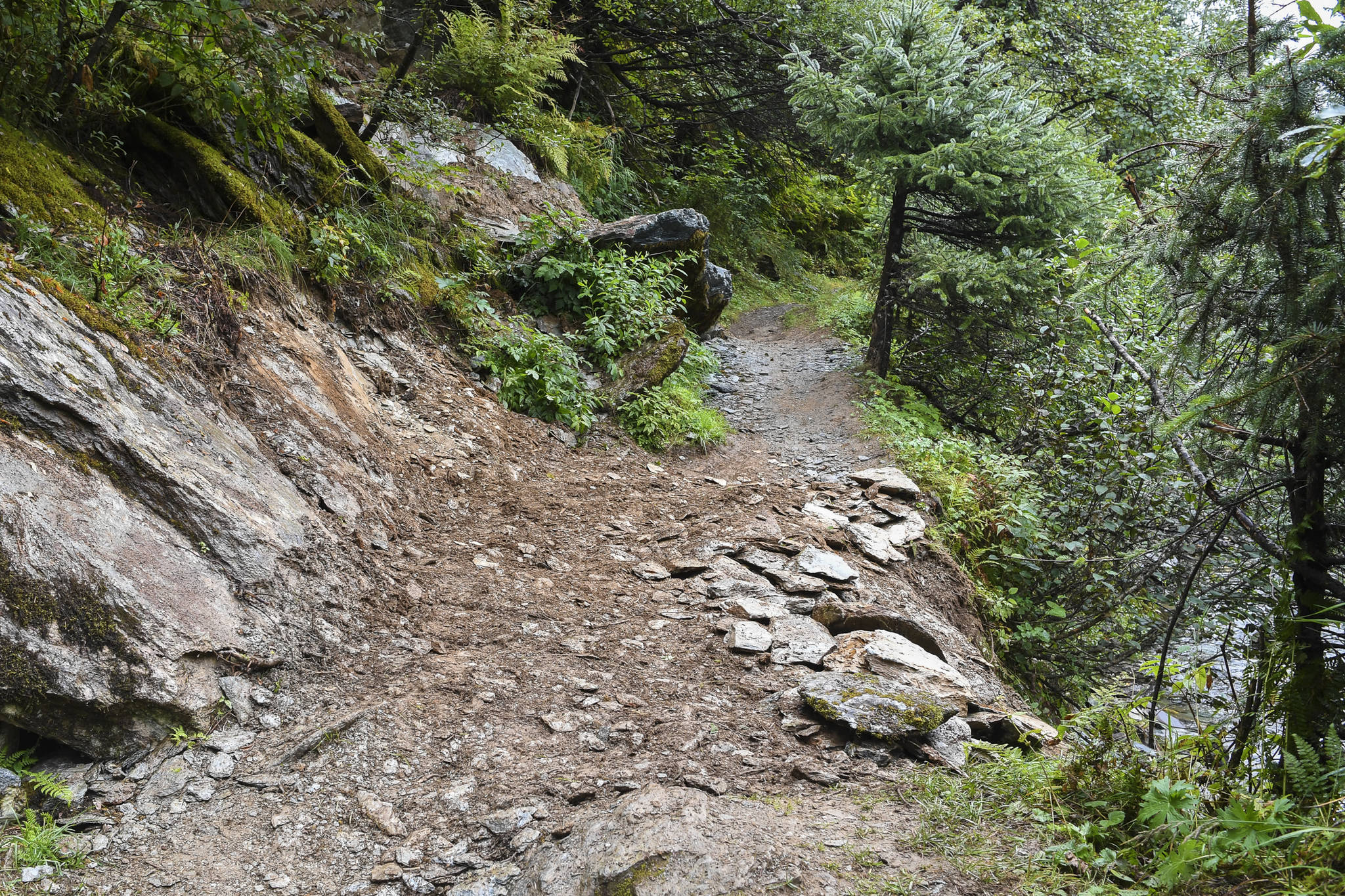 AFTER: An estimated four-ton boulder was removed from Perseverance Trail near the Granite Creek spur on Thursday, Aug. 15, 2019. (Michael Penn | Juneau Empire)