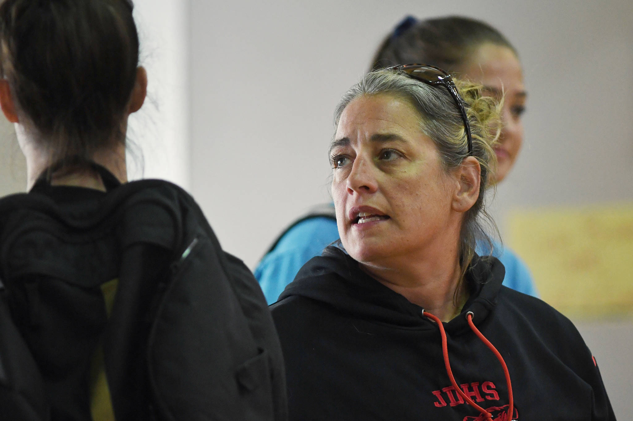 Jody Levernier, head coach of the JDHS volleyball team, talks to players during a volleyball clinic at JDHS on Friday, Aug. 9, 2019. (Michael Penn | Juneau Empire)