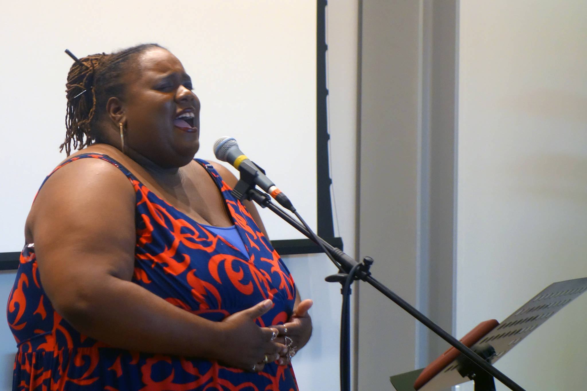 Jocelyn Miles sings during P.O.C. Palooza at the Mendenhall Valley library, Friday, Aug. 16, 2019. (Capital City Weekly | Ben Hohenstatt)