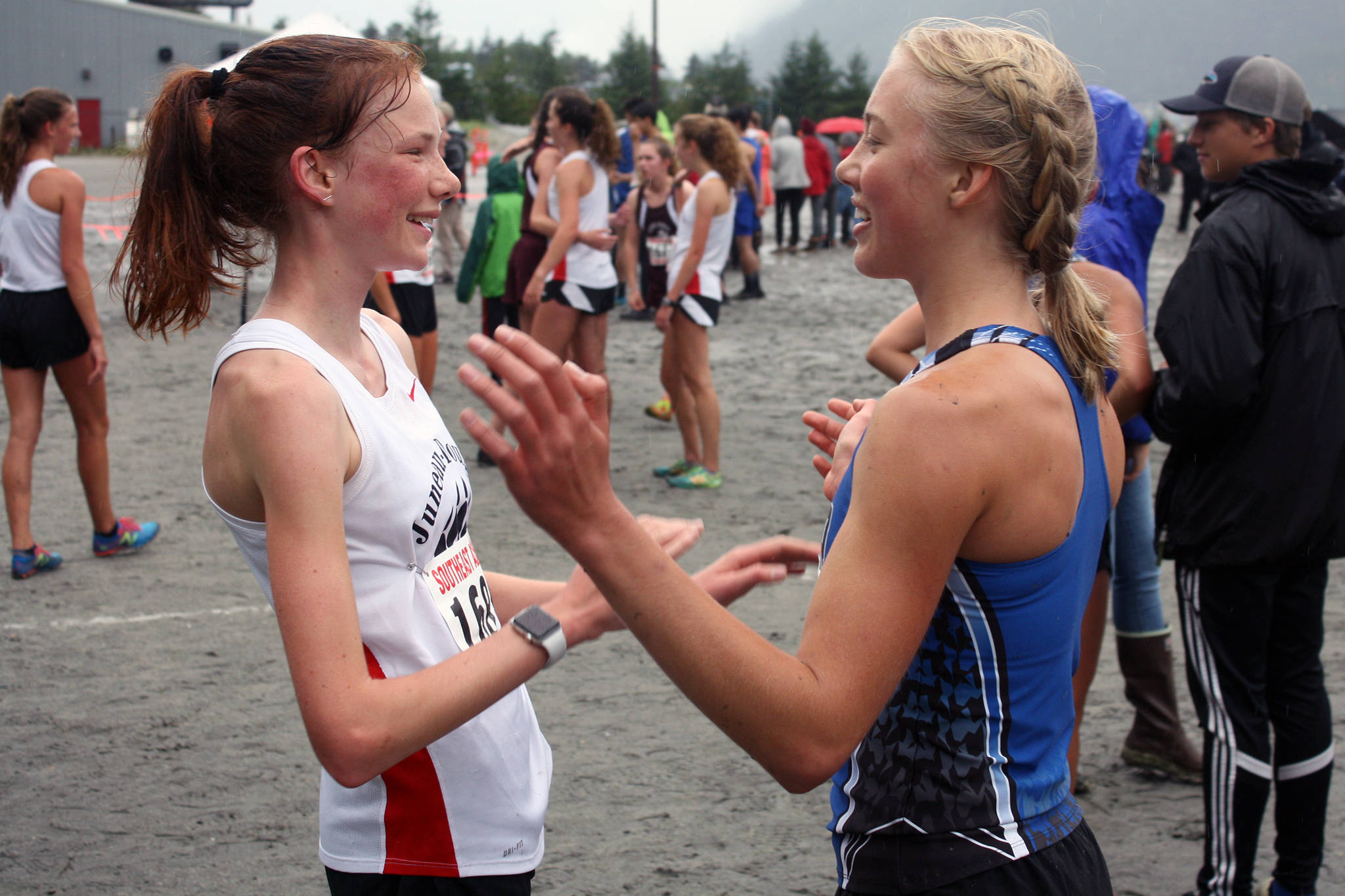 Juneau-Douglas High School: Yadaat.at Kales Annika Schwartz, left, and Thunder Mountain High Schools Hannah Deer congratulate one another after finishing the Douglas Island Mini-Meet on Saturday, Aug. 17, 2019. (Nolin Ainsworth | Juneau Empire)