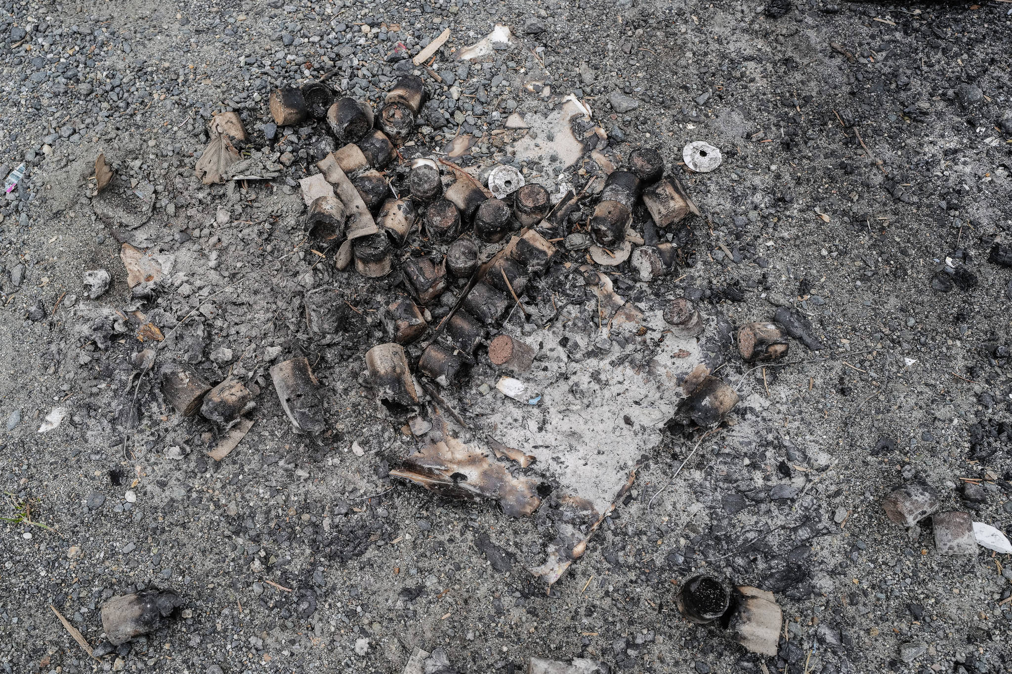 Remnants of fireworks at Sunshine Cove on Monday, Aug. 19, 2019. Capital City Fire/Rescue reports they responded to a wildfire at Sunshine Cove Friday night. Fireworks found on the scene are the suspected cause of the fire according to Capital City Fire/Rescue Assistant Chief Chad Cameron. (Michael Penn Juneau Empire)