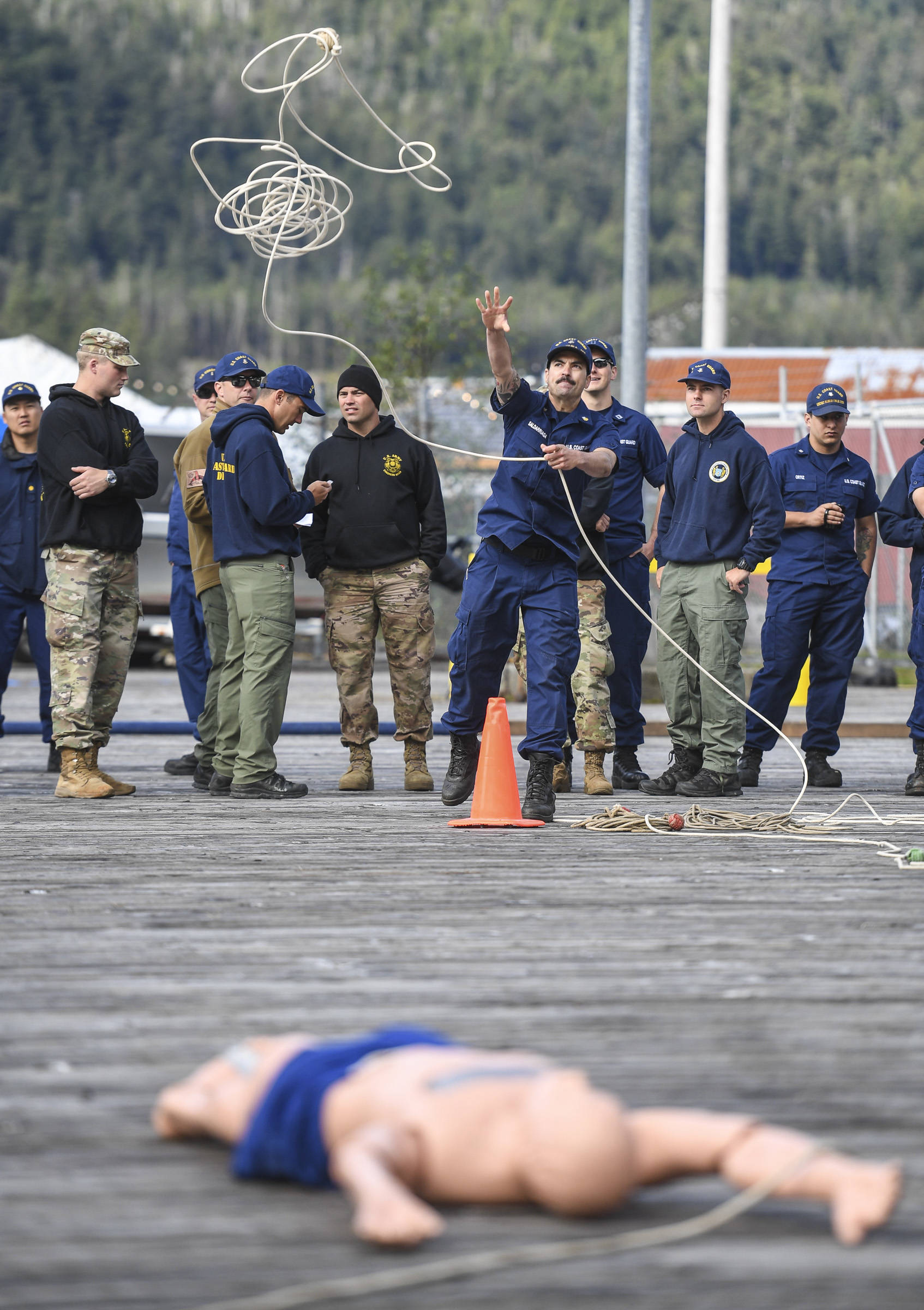 Marcos Saldarriaga, of the U.S. Coast Guard Cutter Kukui, competes in the rope throw during the annual Buoy Tender Olympics at Station Juneau on Wednesday, Aug. 21, 2019. (Michael Penn | Juneau Empire)