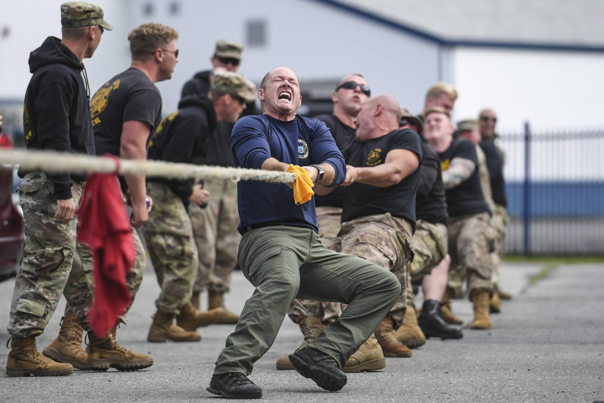 DV1 Shawn Price, of the U.S. Army Dive Team fronts his team during the annual Buoy Tender Olympics at Station Juneau on Wednesday, Aug. 21, 2019. (Michael Penn | Juneau Empire)
