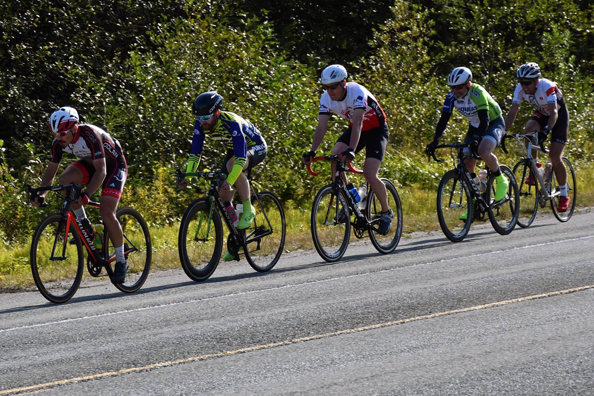David Jackson, in front, leads Will Coleman, Justin Dorn, John Bursell and Allan Spangler on the End of the Road Bike race, the final stage of the Tour of Juneau on Sunday, Aug. 18, 2019. (Courtesy Photo | Rob Welton)