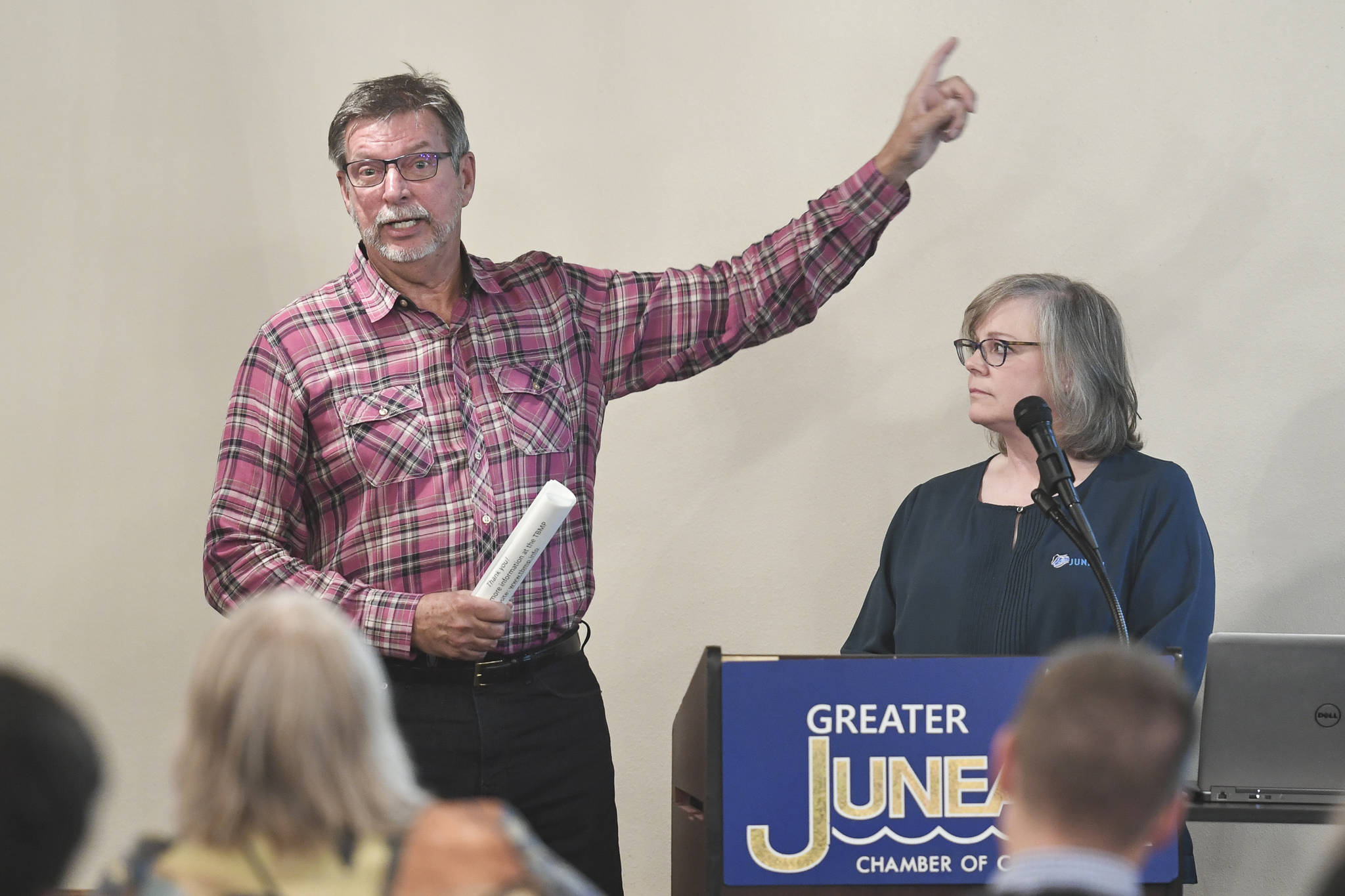 Kirby Day, operations manager for Princess Cruises, left, and Liz Perry, CEO and President of Travel Juneau, speak about visitor industry issues during the Juneau Chamber of Commerce’s weekly luncheon at the Moose Lodge on Thursday, Aug. 22, 2019. (Michael Penn | Juneau Empire)
