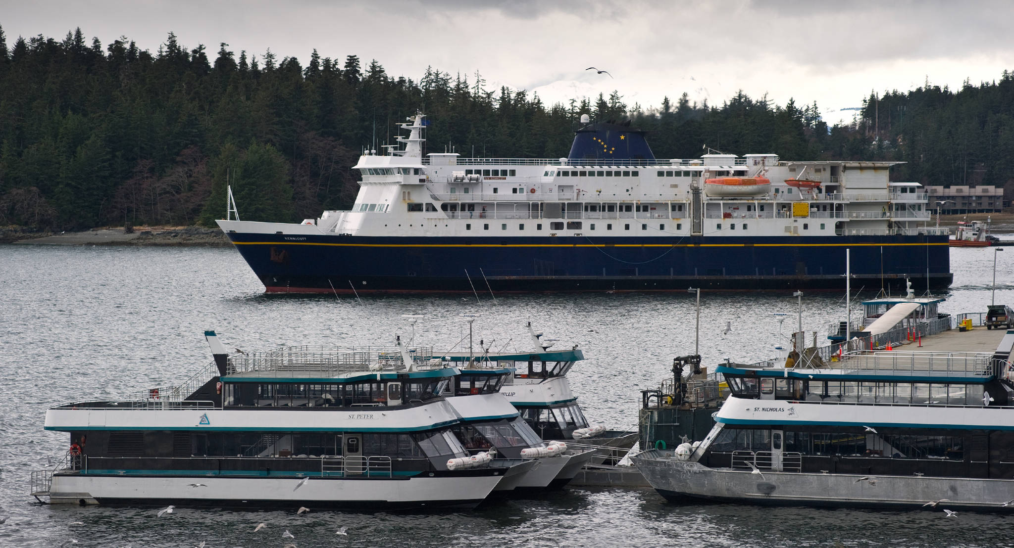 The Alaska Marine Highway System’s M/V Kennicott pulls away from the Auke Bay Ferry Terminal in this August 2014 photo. The Kennicott was the first vessel on the scene to help five Canadians who jumped into the water south of Bella Bella, British Columbia, Canada, to escape a sinking ship. (Michael Penn | Juneau Empire File)