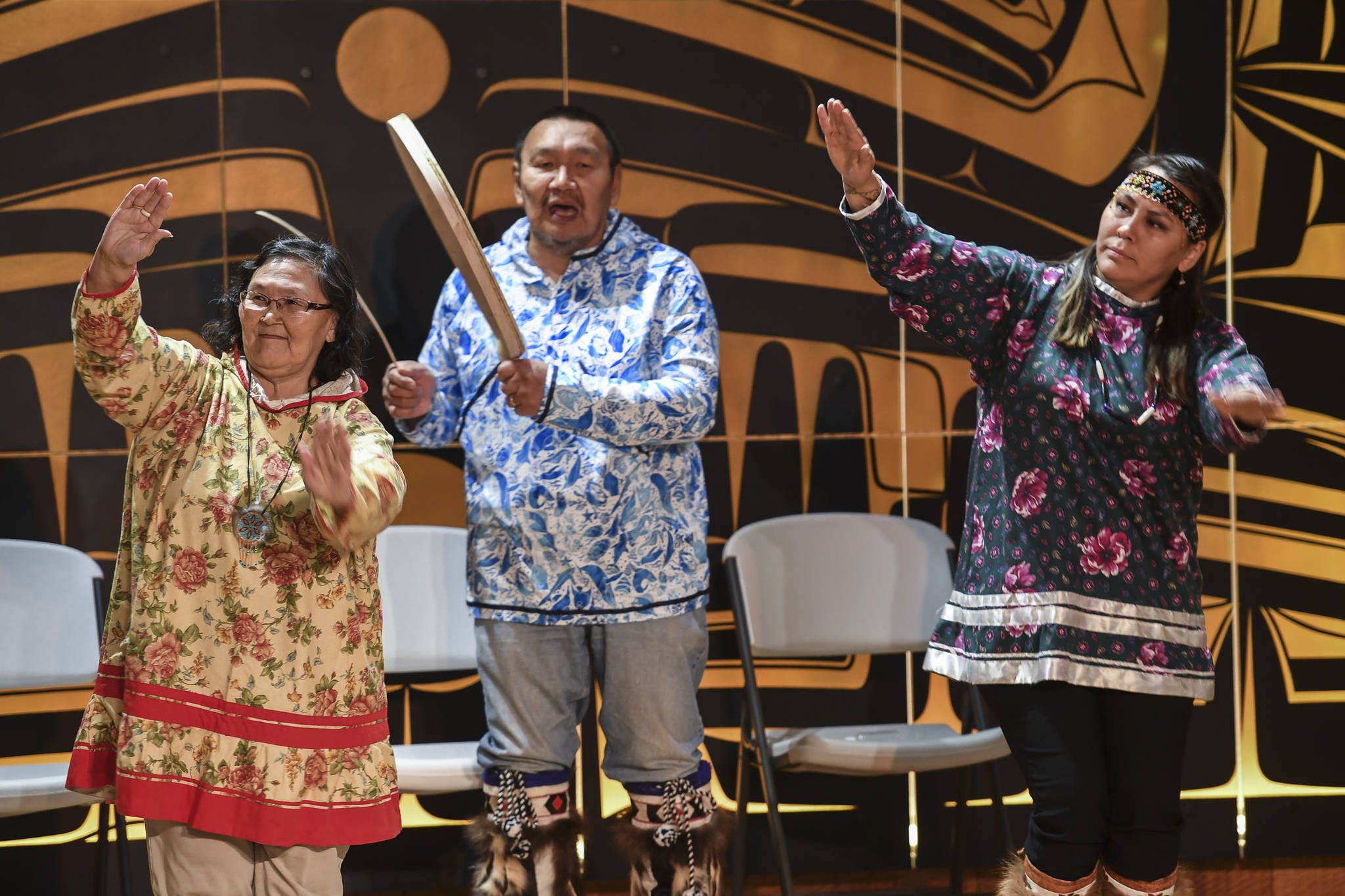 Sealaska Heritage Institute Artists-in-Residence John Waghiyi Jr. and his wife, Arlene Annogiyuk Waghiyi, of Savoonga, perform St. Lawrence Island dancing and song with their niece, Rana Mokiyuk, right, at the Walter Soboleff Center on Wednesday, Aug. 28, 2019. (Michael Penn | Juneau Empire)