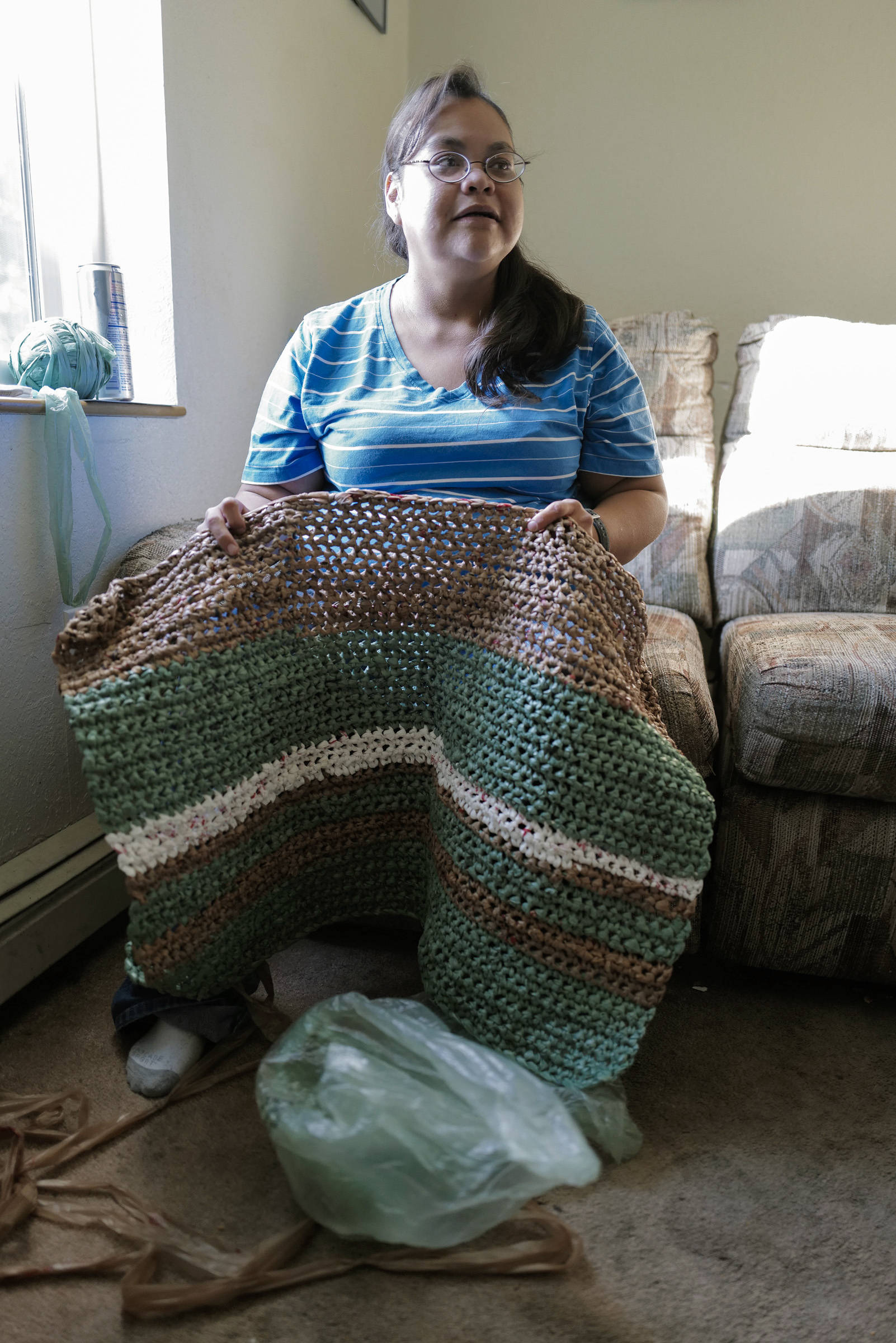 Star White talks about her personal project to make sleeping mats for Juneau’s homeless using plastic grocery bags on Thursday, Aug. 29, 2019. (Michael Penn | Juneau Empire)