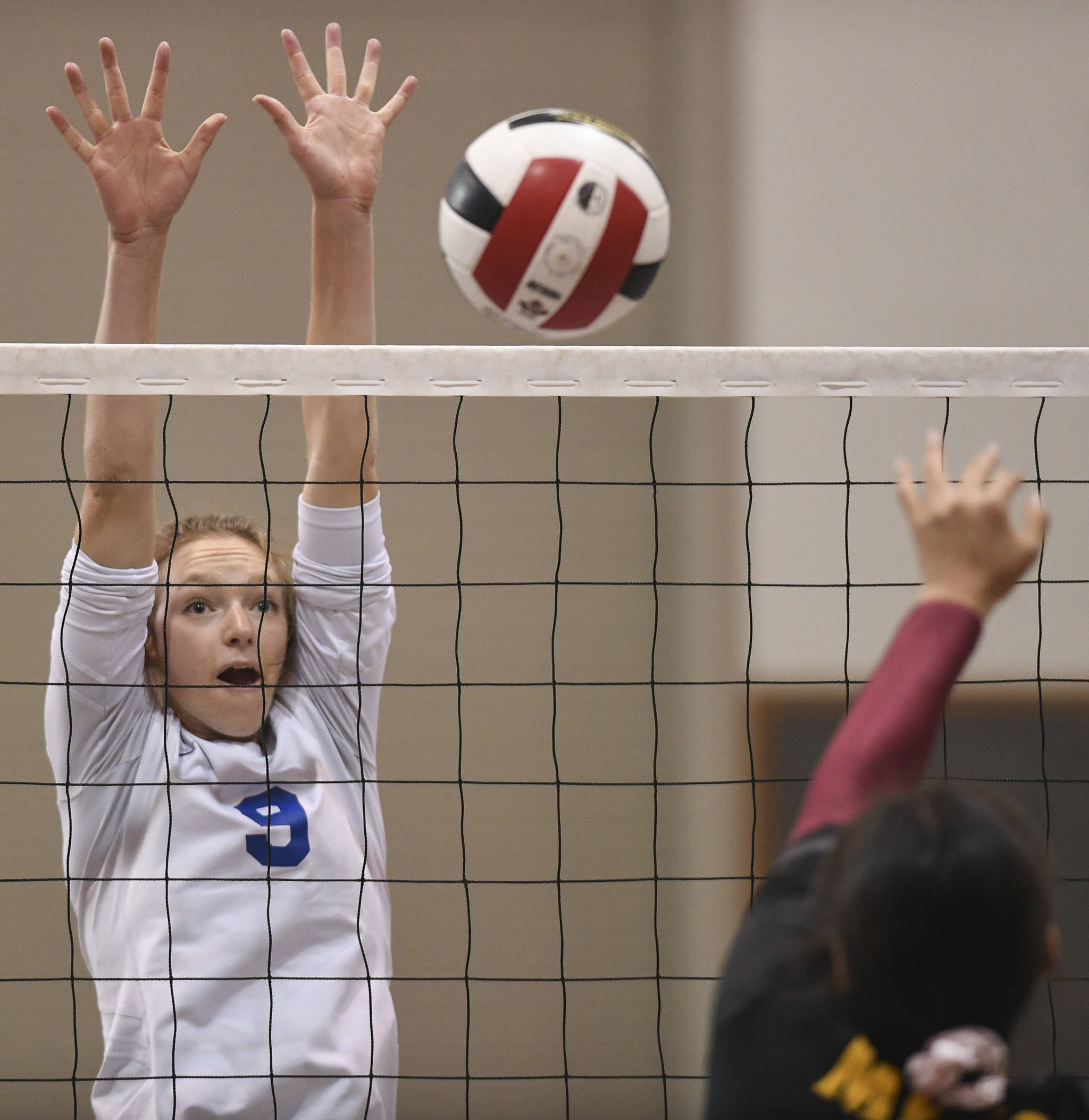 Thunder Mountain’s Sophie Harvey attempts a block against Mt. Edgecumbe at the Volleyball Jamboree at Juneau-Douglas High School: Yadaa.at Kalé on Friday, Aug. 30, 2019. (Michael Penn | Juneau Empire)