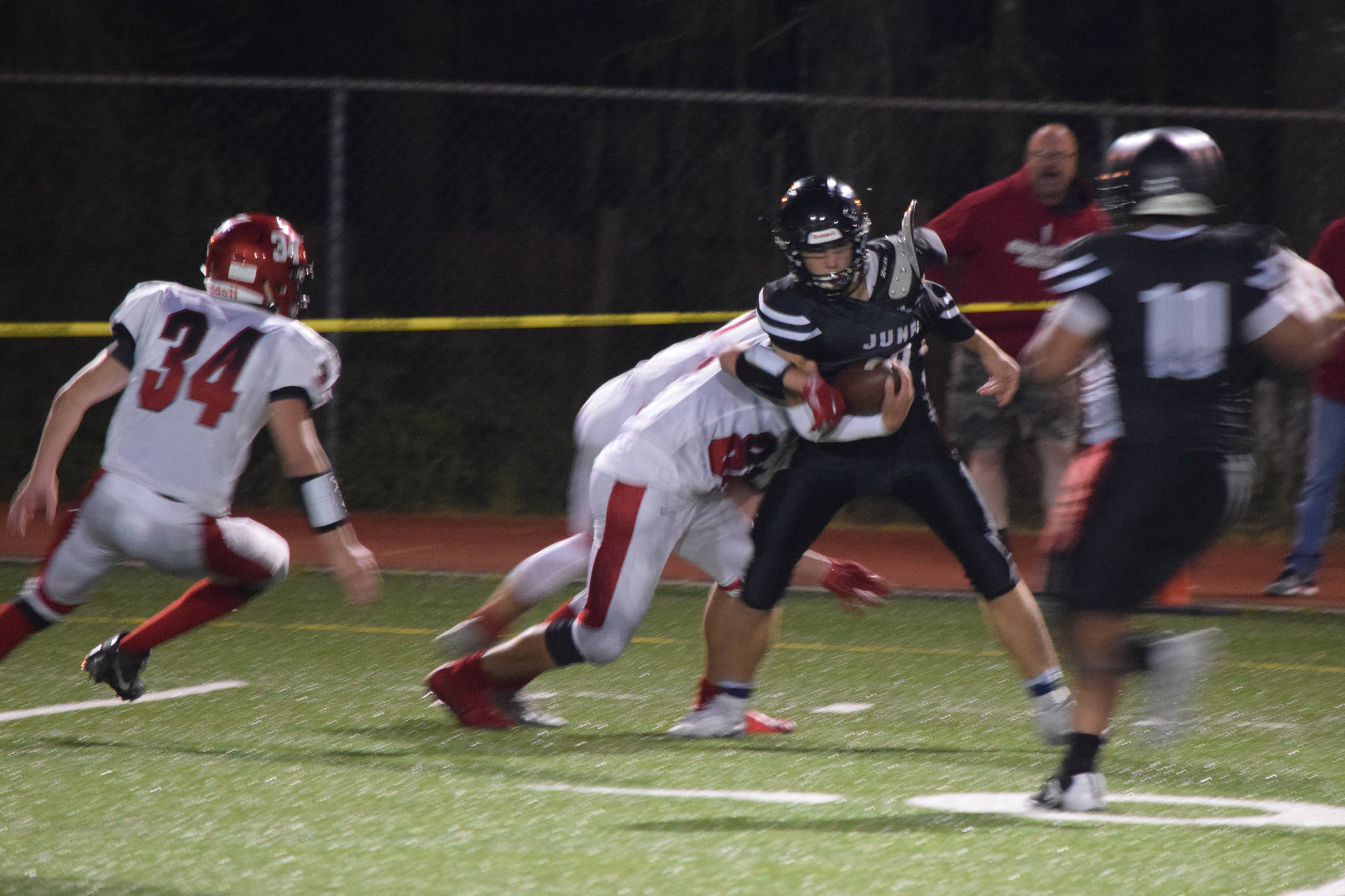 Juneau Huskies receiver Wallace Adams comes down with the ball in the fourth quarter in a nonconference game against the Kenai Kardinals at Adair-Kennedy Memorial Park on Saturday, Aug. 31, 2019. (Nolin Ainsworth | Juneau Empire)