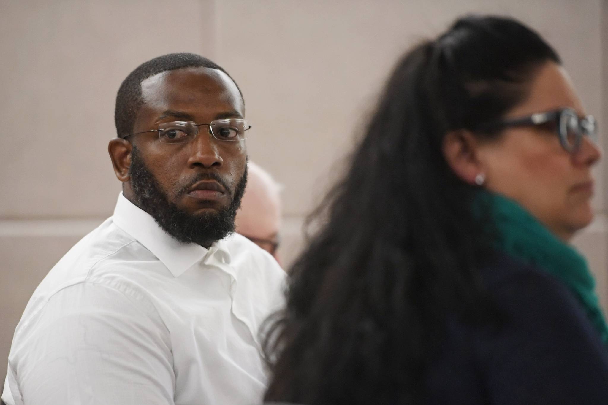 Laron Carlton Graham listens to his attorney, Natasha Norris, in Juneau Superior Court on Tuesday, Sept. 3, 2019, during his trial on two counts of first-degree murder for the Nov. 14, 2015 shooting deaths of 36-year-old Robert H. Meireis and 34-year-old Elizabeth K. Tonsmeire. (Michael Penn | Juneau Empire)