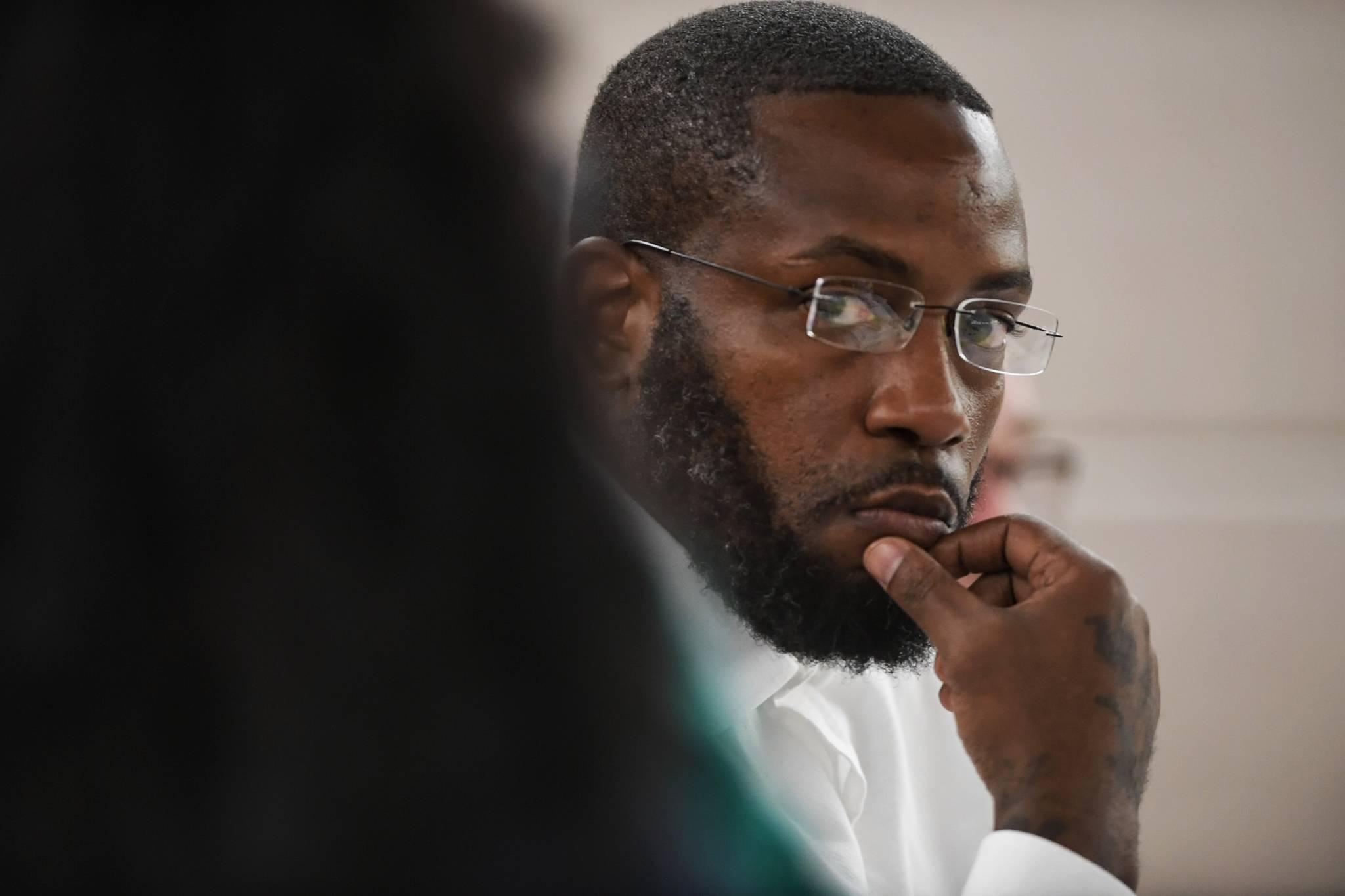 Laron Carlton Graham listens to his attorney, Natasha Norris, in Juneau Superior Court on Tuesday, Sept. 3, 2019, during his trial on two counts of first-degree murder for the Nov. 14, 2015 shooting deaths of 36-year-old Robert H. Meireis and 34-year-old Elizabeth K. Tonsmeire. (Michael Penn | Juneau Empire)