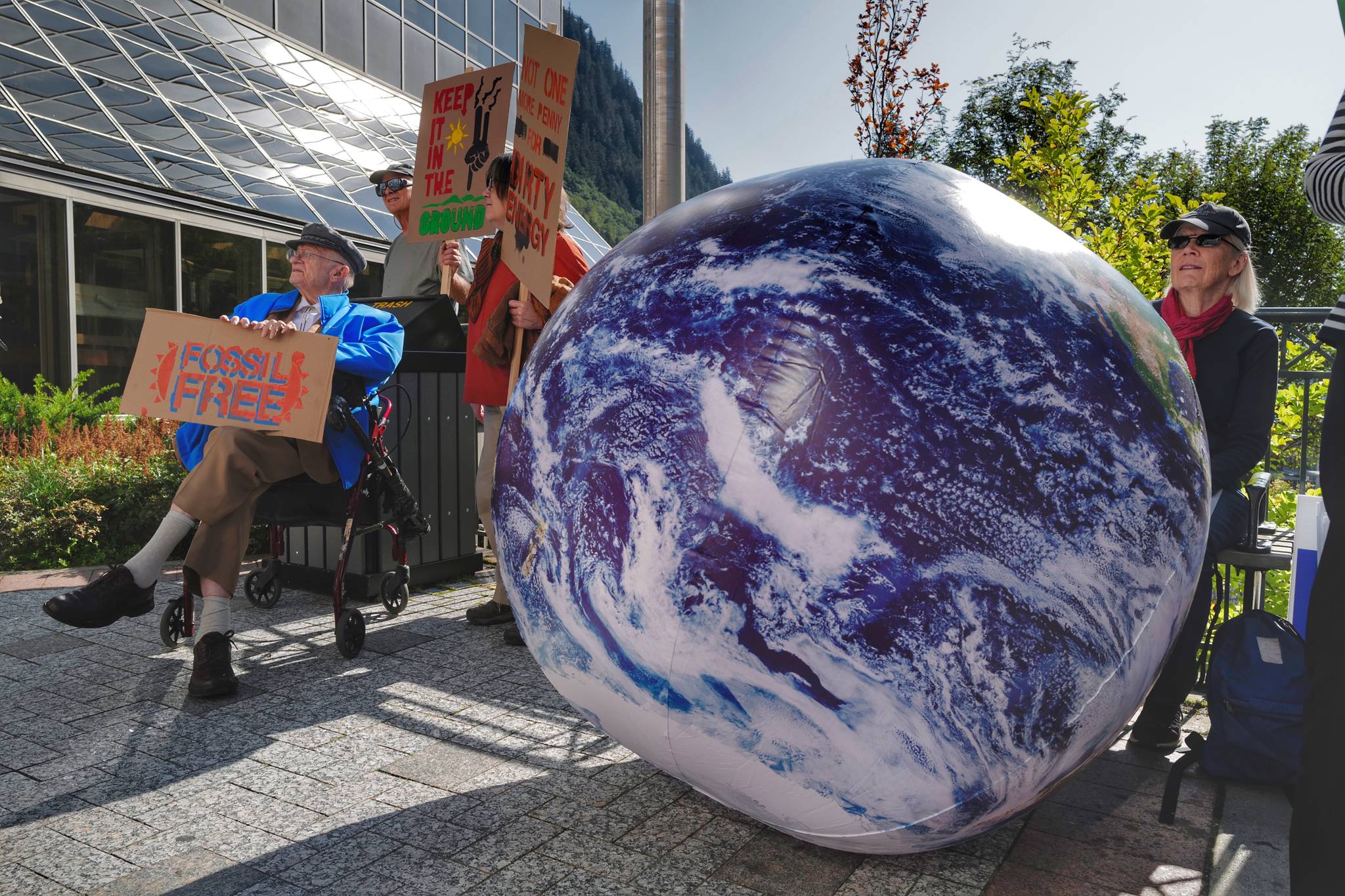 Juneau residents arrive for a “Stand Strong for Climate” rally in front of the Alaska State Capitol on Tuesday, Sept. 10, 2019. (Michael Penn | Juneau Empire)